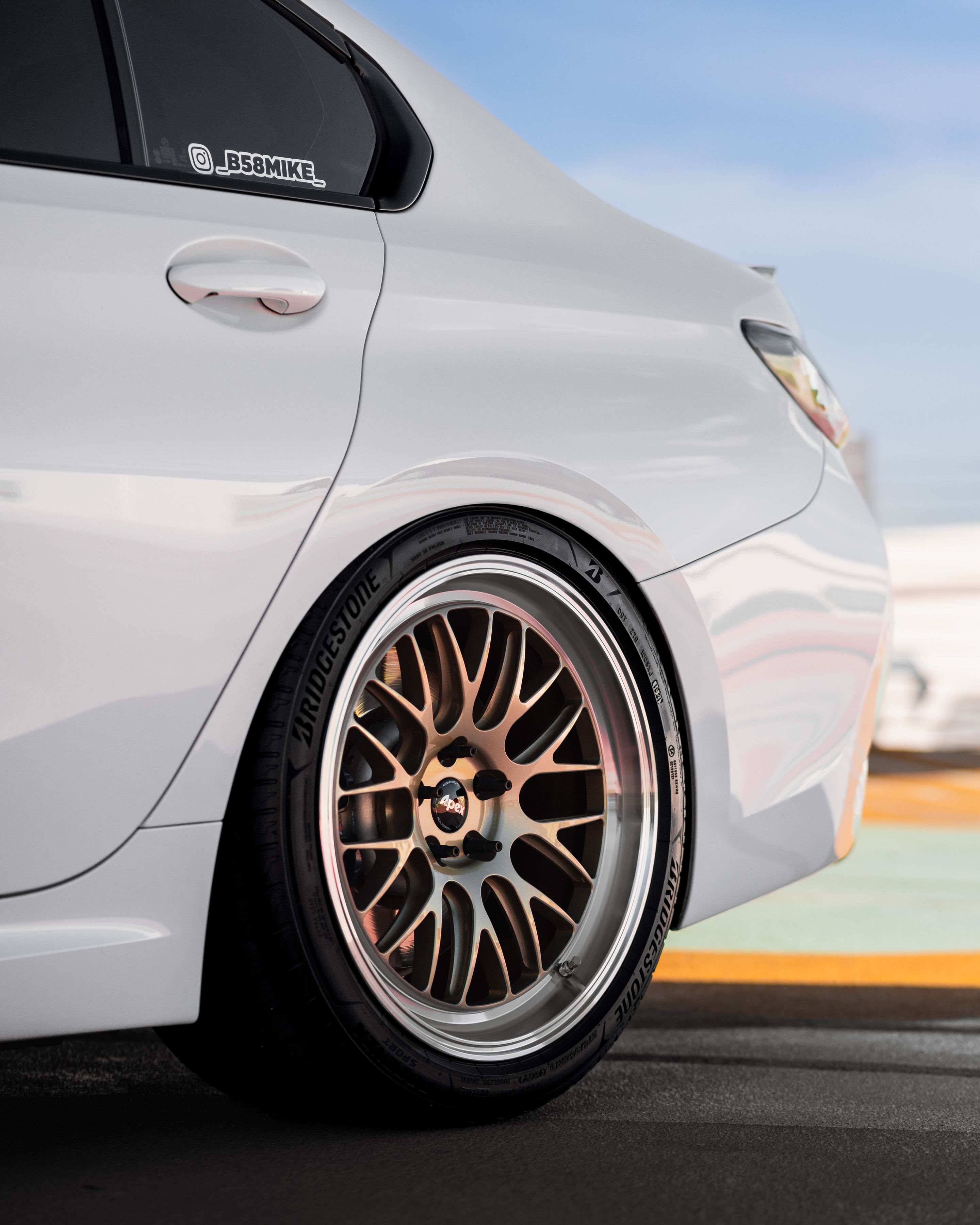 White BMW G20 Sedan 3 Series with 19" ML-10RT Apex wheels in Machined Lip Gloss Motorsport Gold