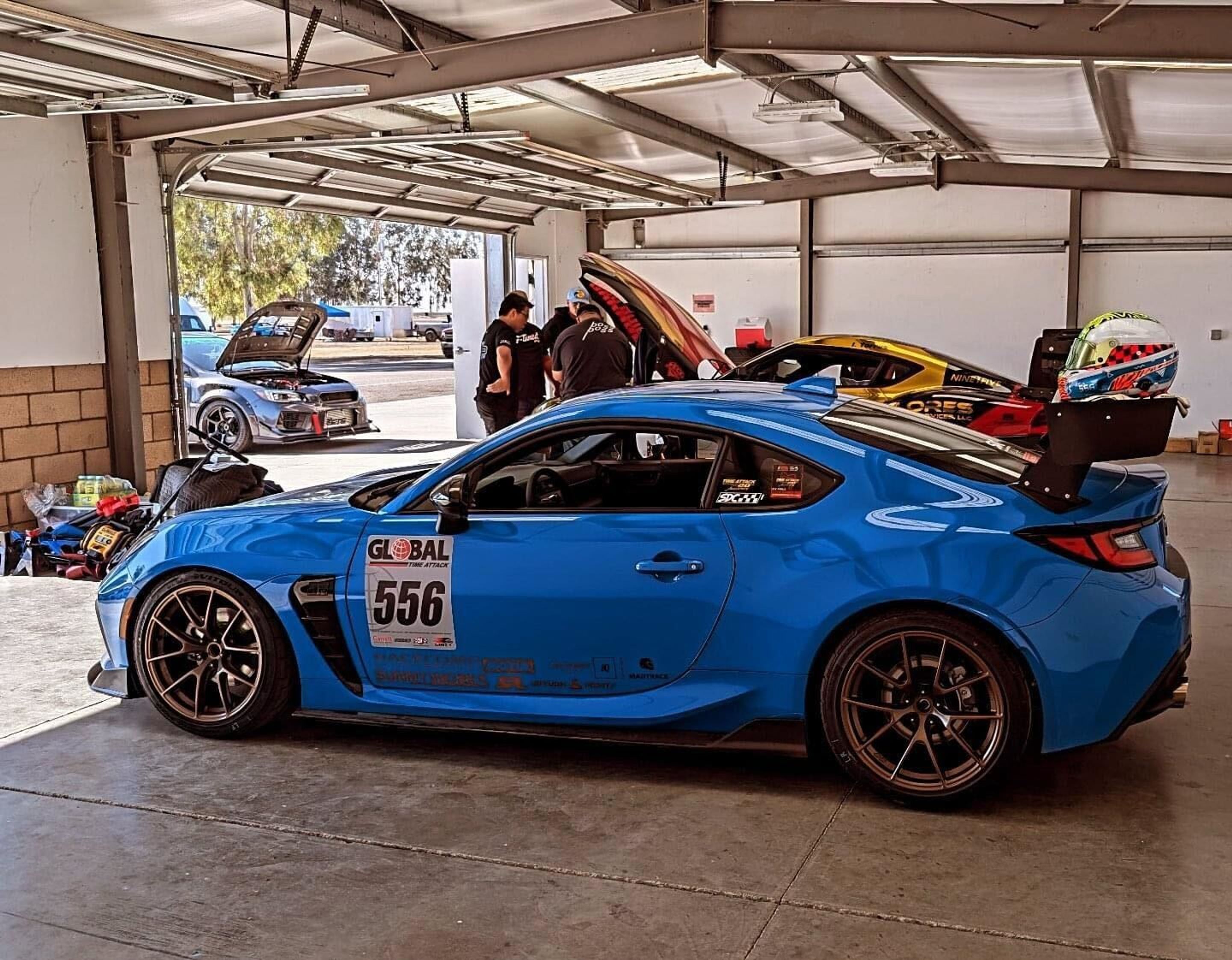 Blue Toyota GR86 with 18" VS-5RS Apex wheels in Satin Bronze