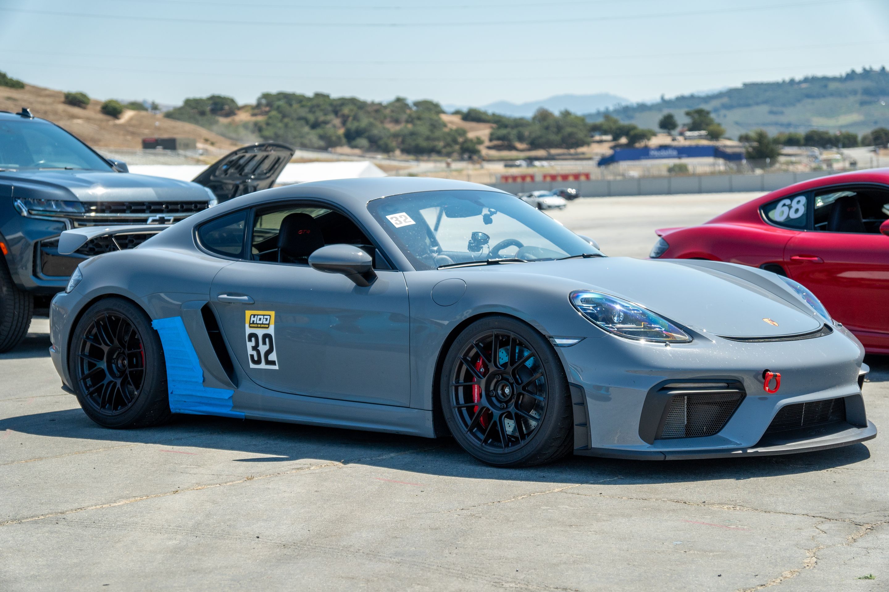 Grey Porsche 718 Cayman GT4 with 19" EC-7RS Apex wheels in Satin Black