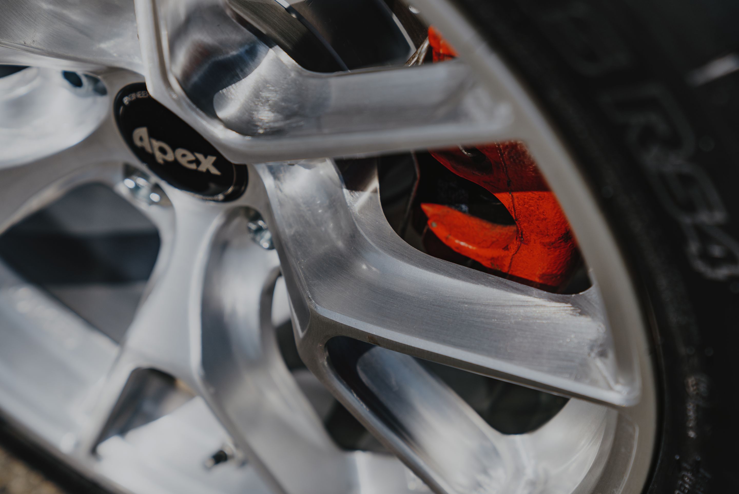 White VW MK6 GTI with 17" VS-5RS Apex wheels in Brushed Clear