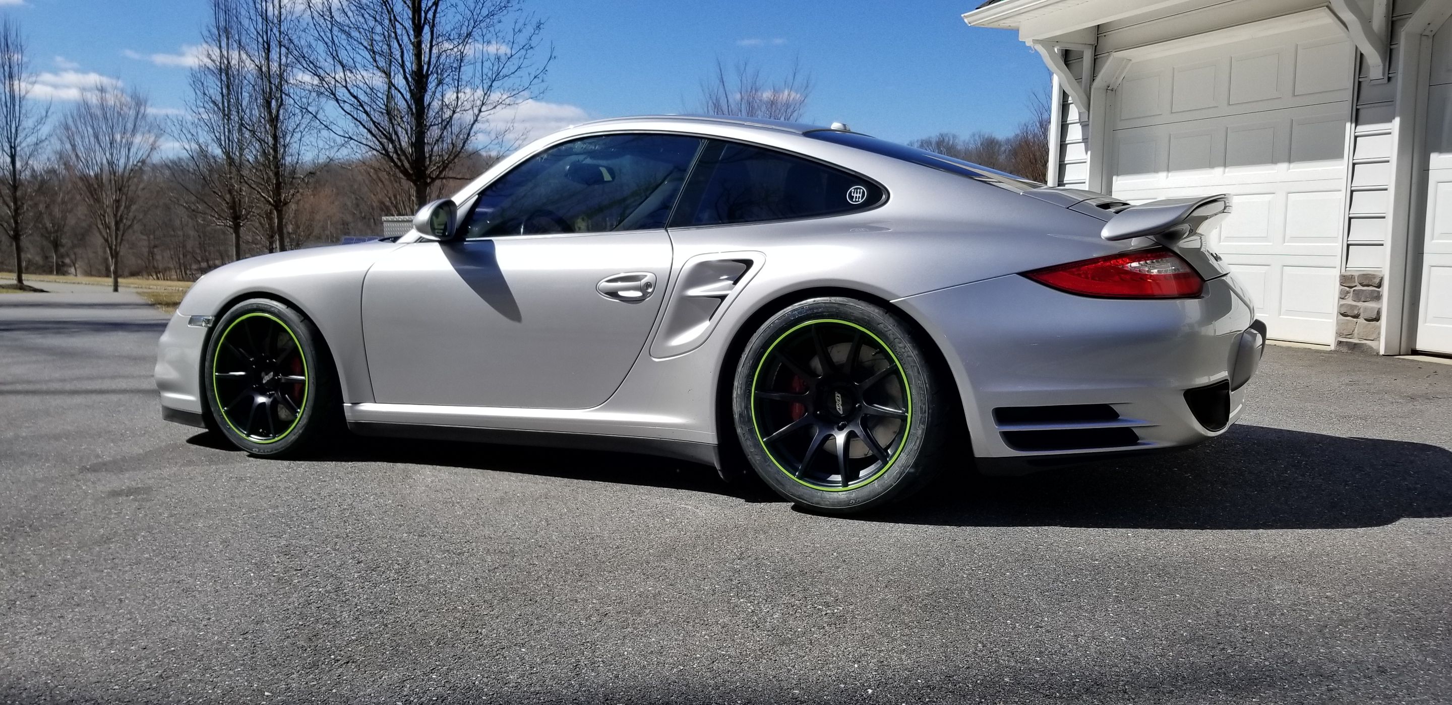 Silver Porsche 911 997 Turbo with 18" SM-10 Apex wheels in Satin Black