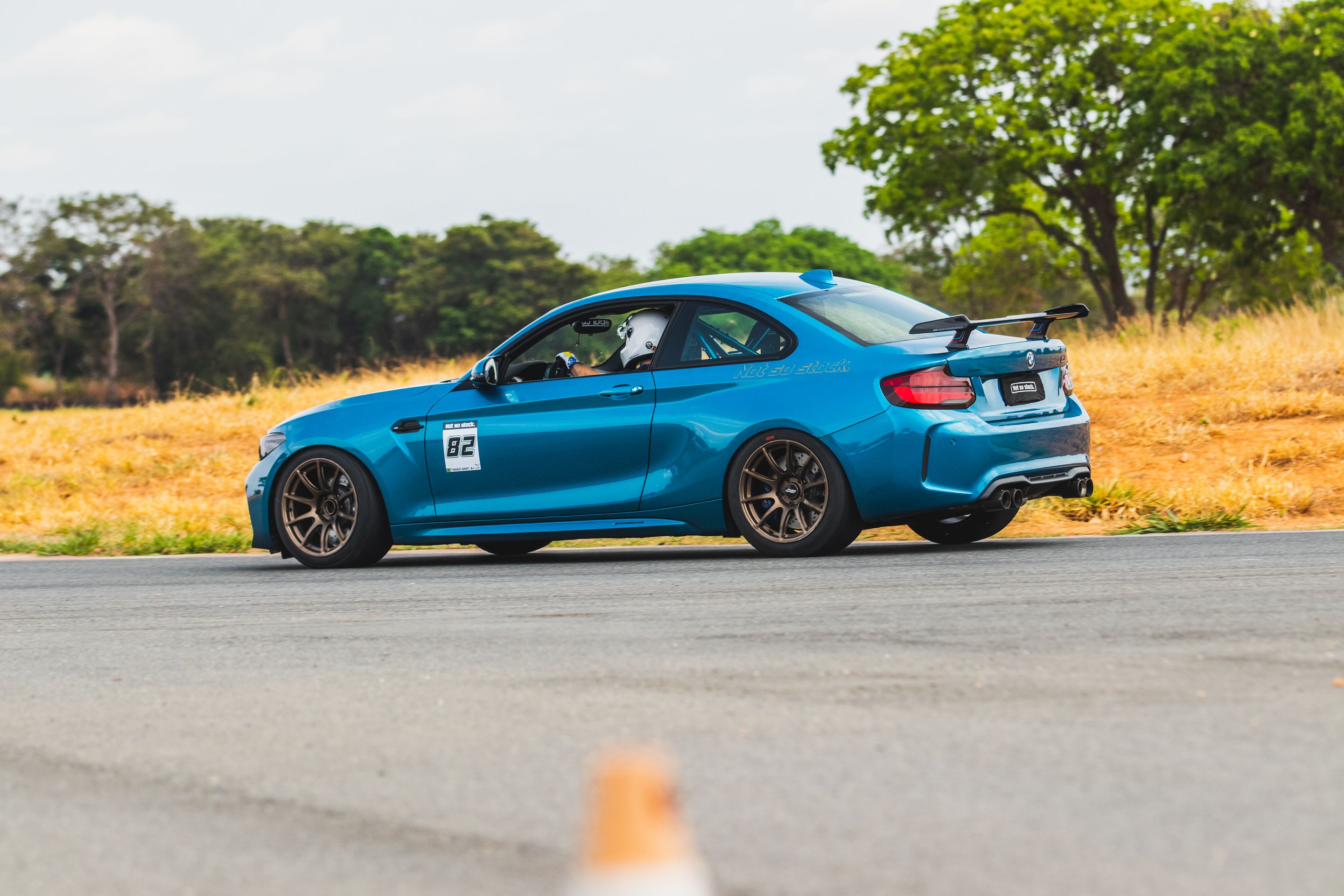 Blue BMW F87 M2 with 18" SM-10 Apex wheels in Custom Finish