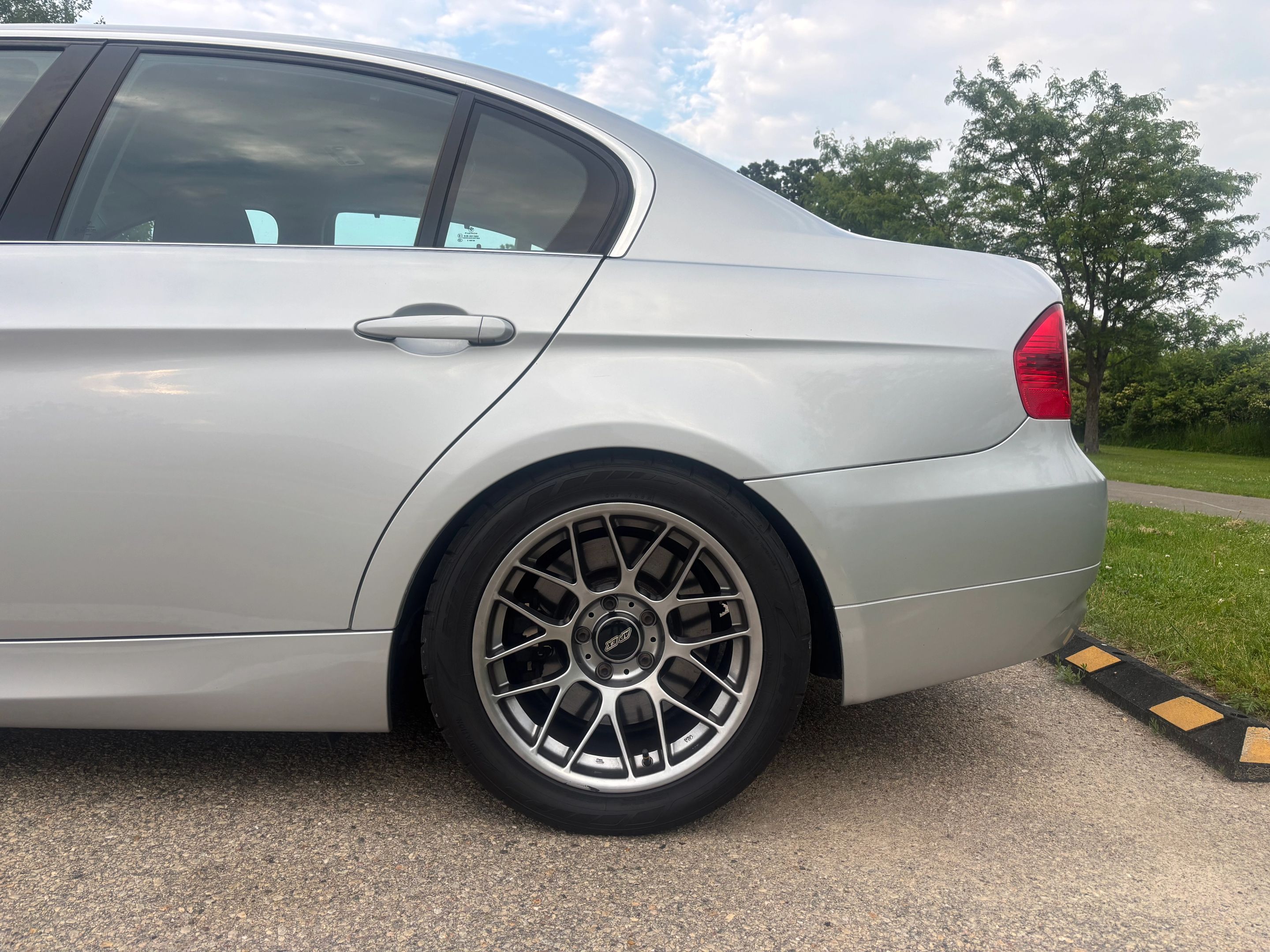 Silver BMW  3 Series with 17" ARC-8 Apex wheels in Hyper Black