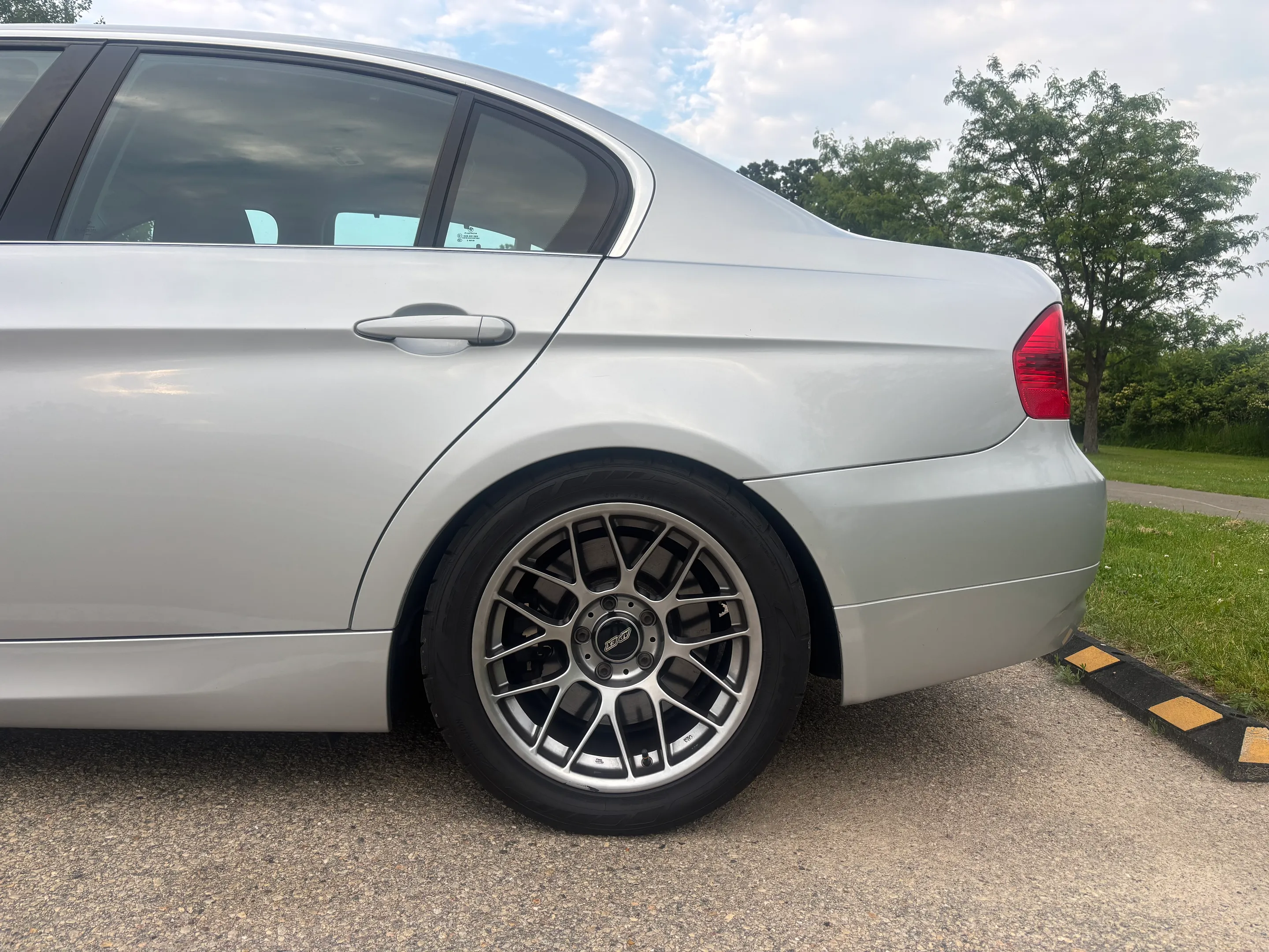 Silver BMW  3 Series with 17" ARC-8 Apex wheels in Hyper Black