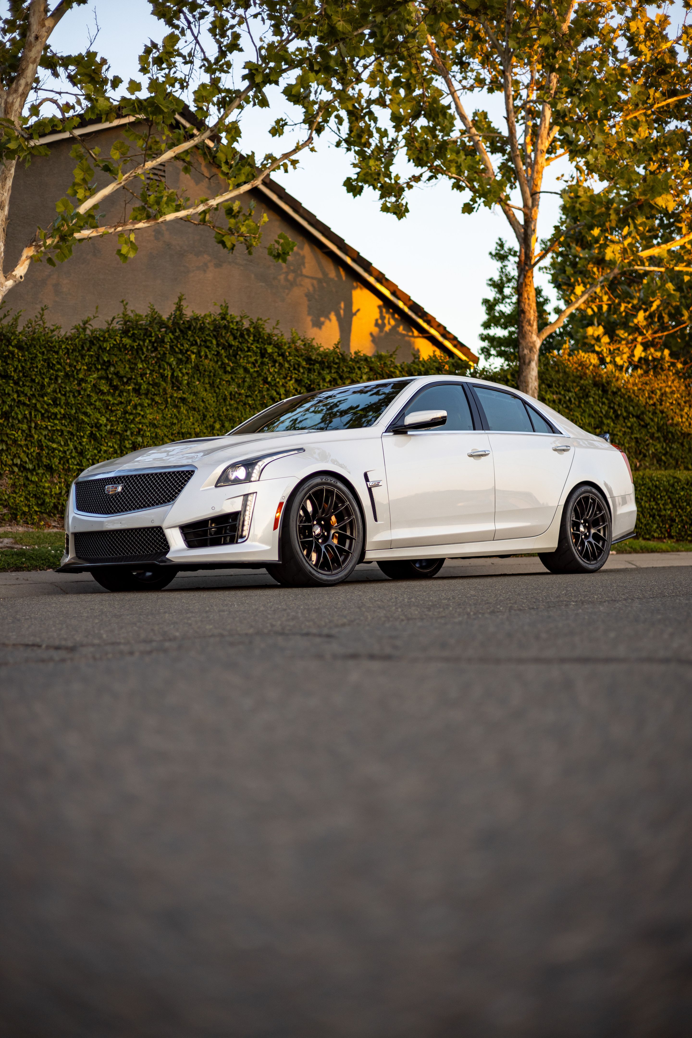 White Cadillac Gen 3 CTS-V with 19" EC-7RS Apex wheels in Satin Black