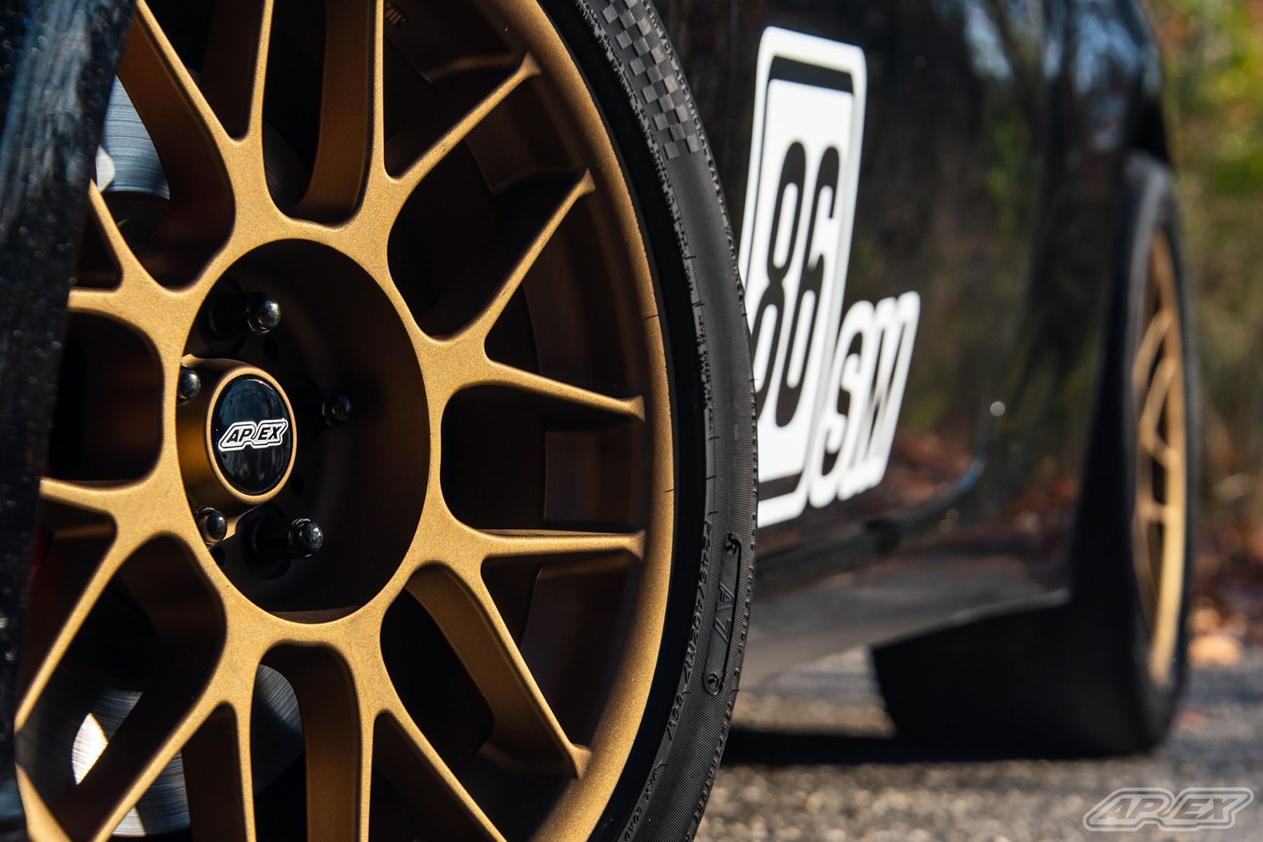 Black Scion FR-S with 17" ARC-8 Apex wheels in Satin Bronze