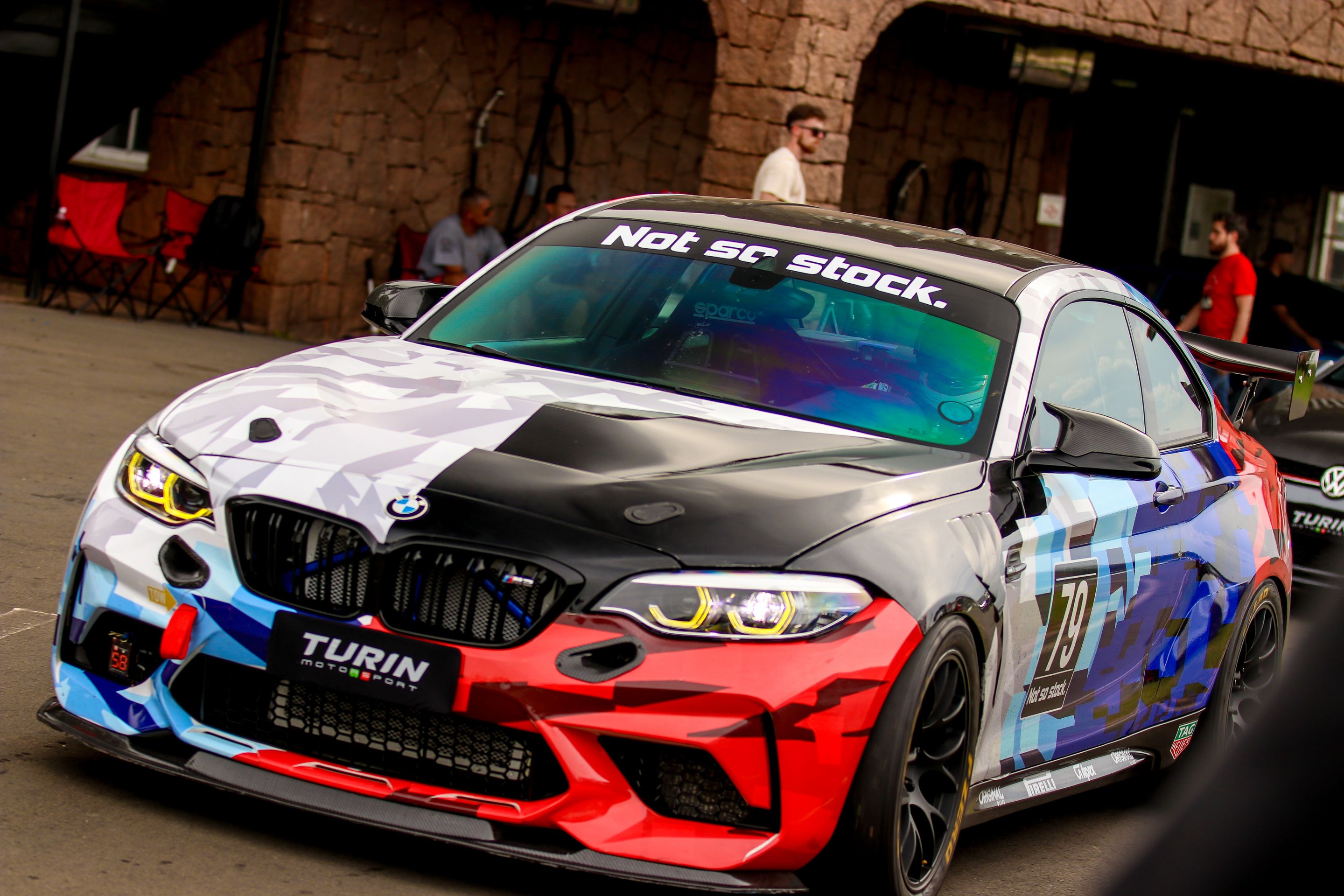Multicolor BMW F87 M2 with 18" EC-7 Apex wheels in Satin Black