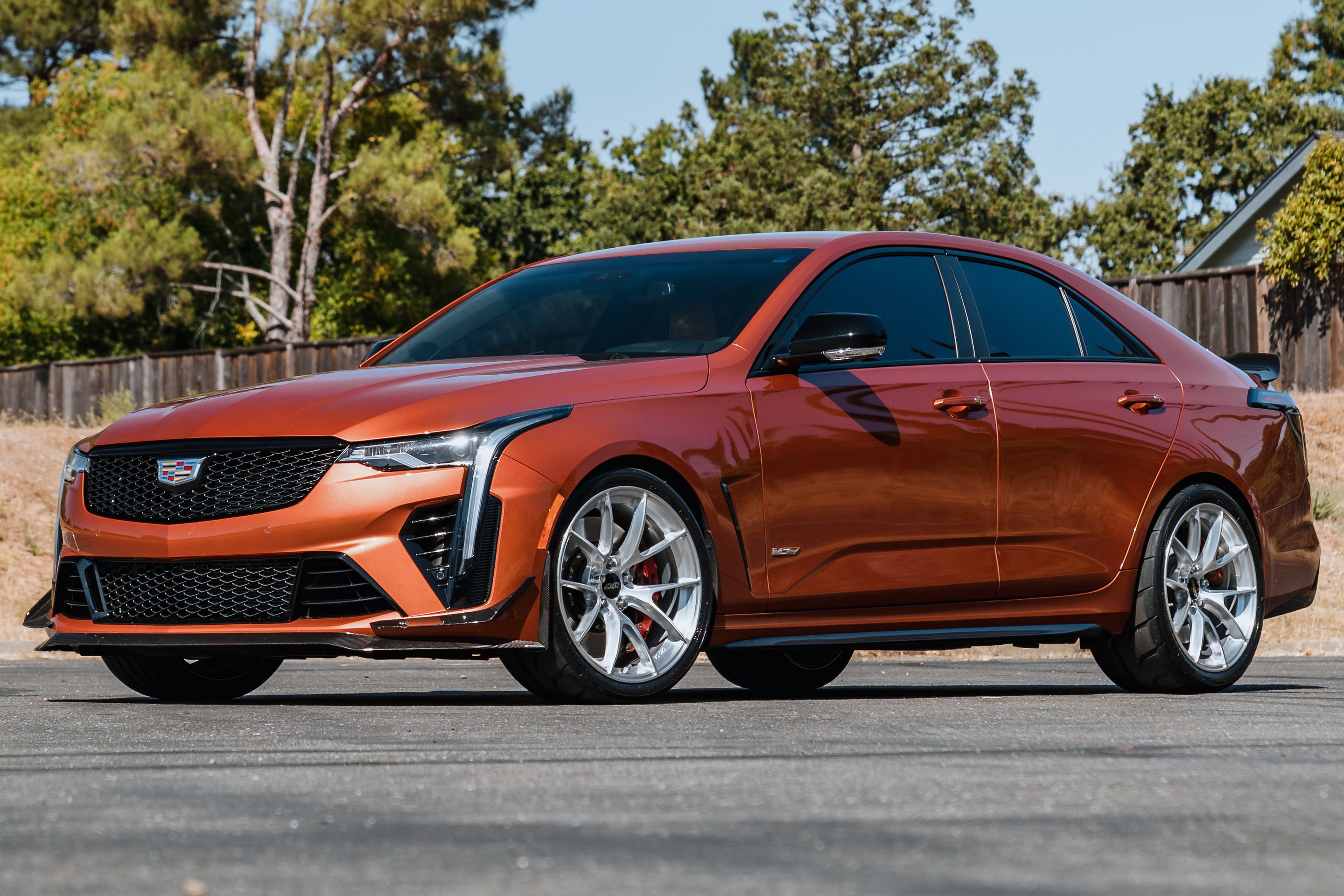 Orange Cadillac CT4-V Blackwing with 19" VS-5RS Apex wheels in Brushed Clear