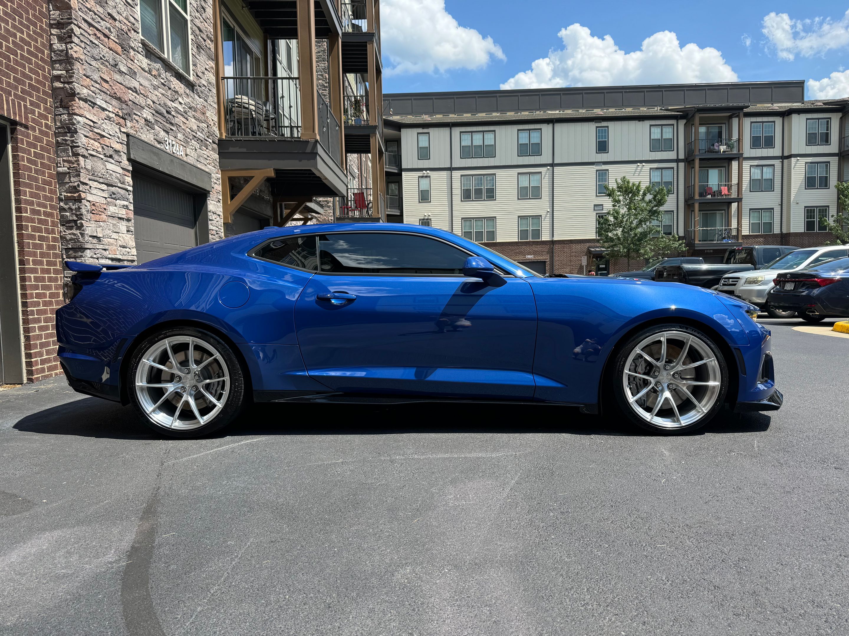 Blue Chevrolet 6th Gen Camaro ZL1 with 20" VS-5RS Apex wheels in Brushed Clear
