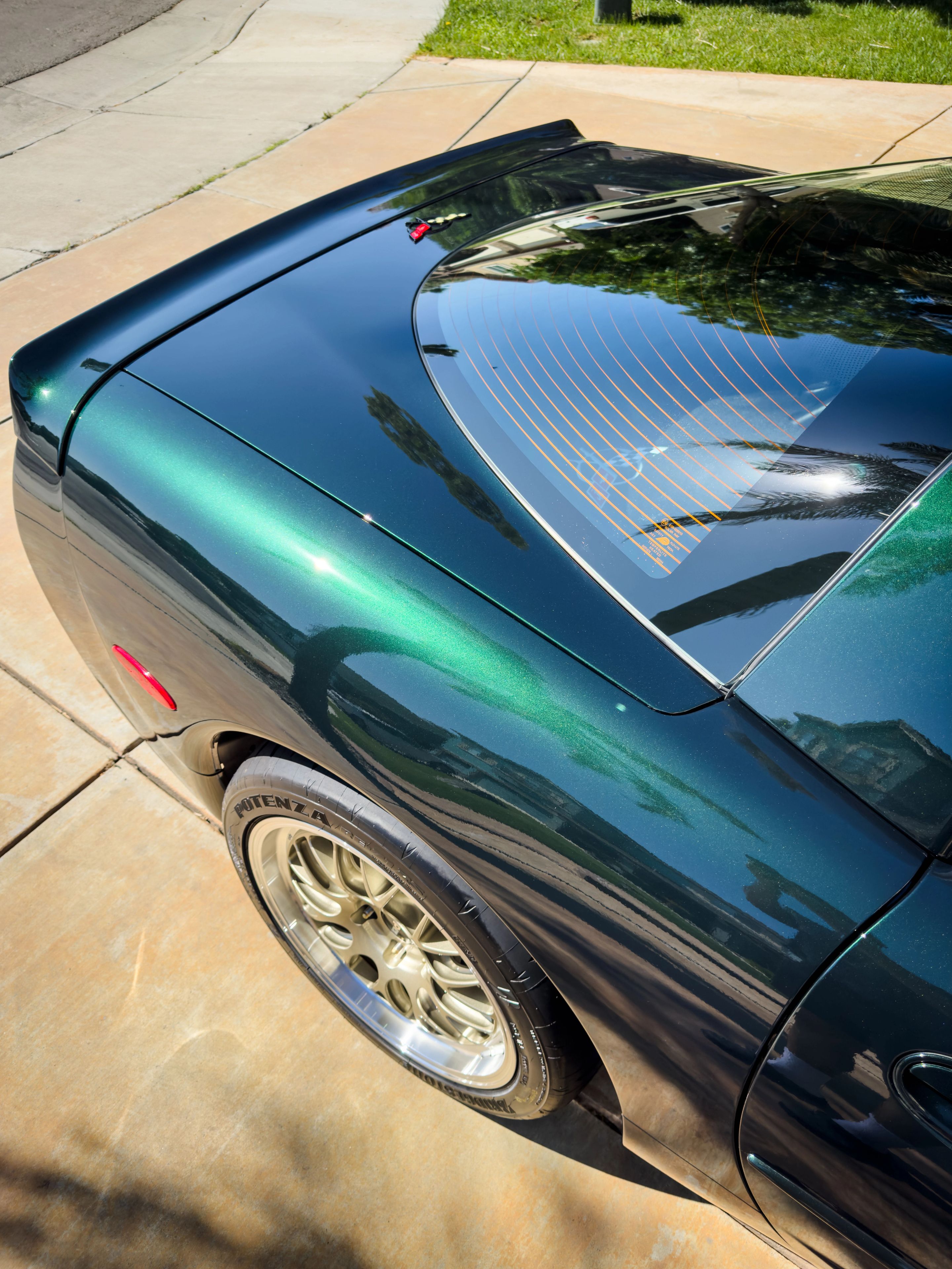 Green Chevrolet C5 Corvette Z06 with 18" ML-10RT Apex wheels in Machined Lip Gloss Motorsport Gold