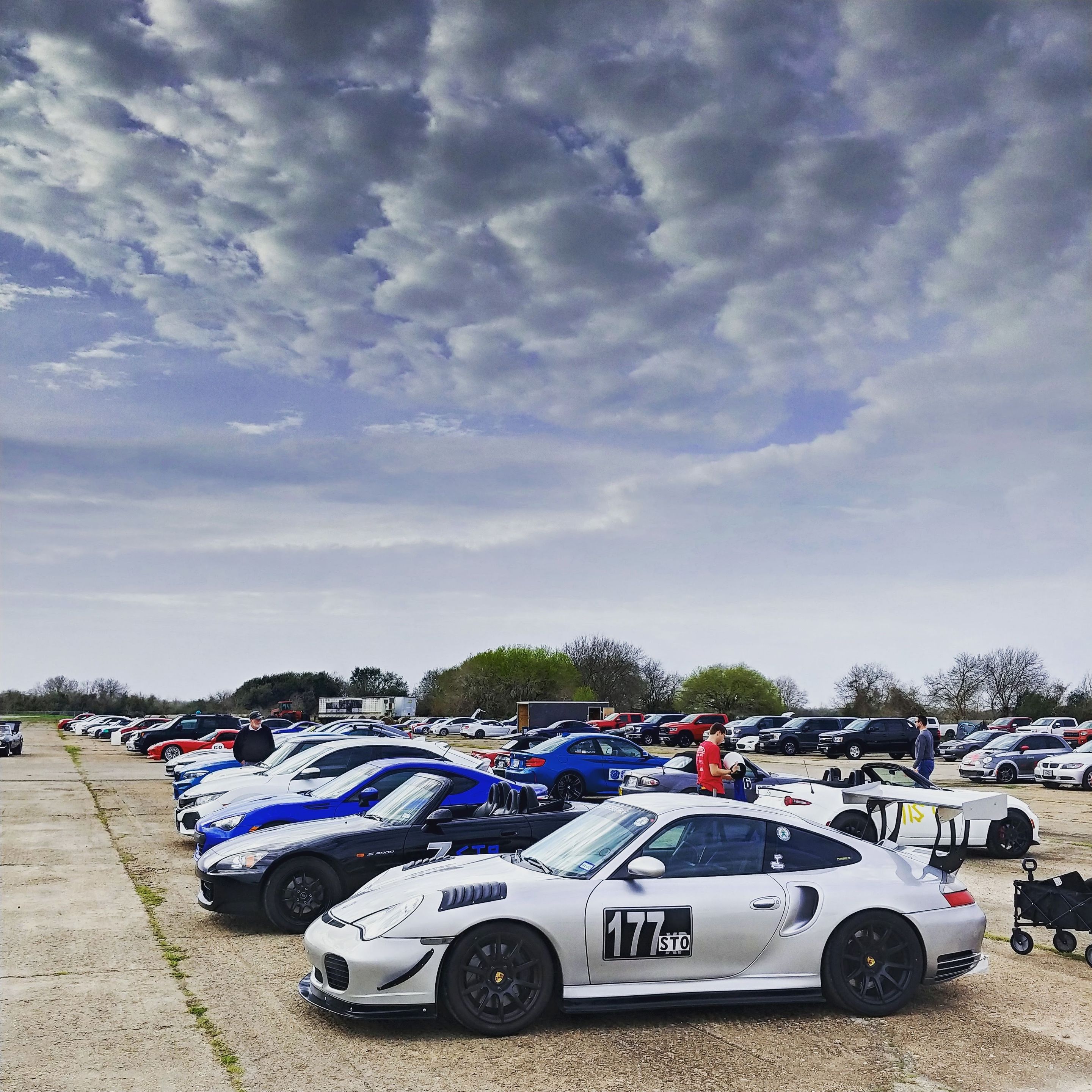 Silver Porsche 911 996 Turbo with 18" SM-10 Apex wheels in Satin Black