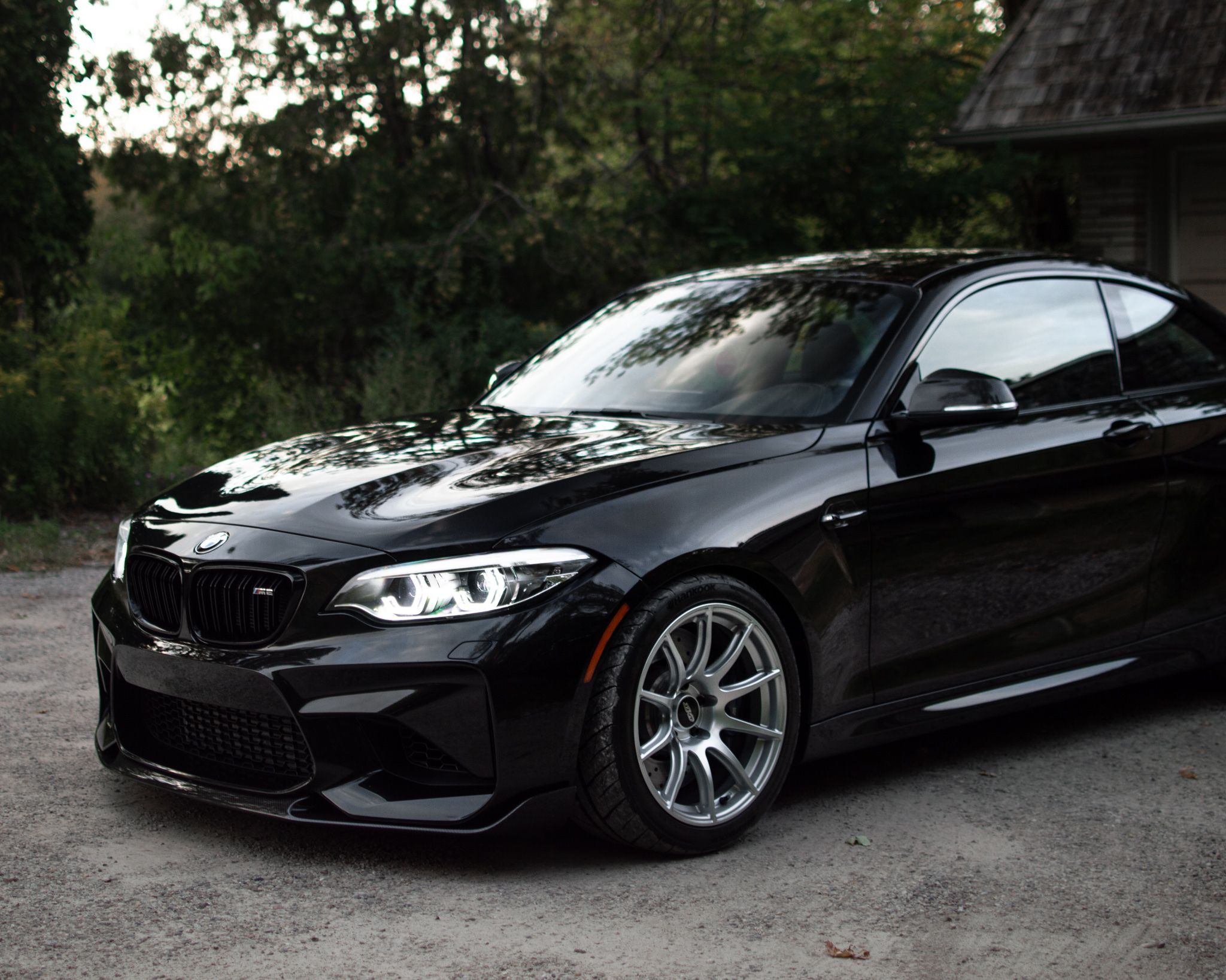Black BMW F87 M2 with 18" SM-10 Apex wheels in Race Silver