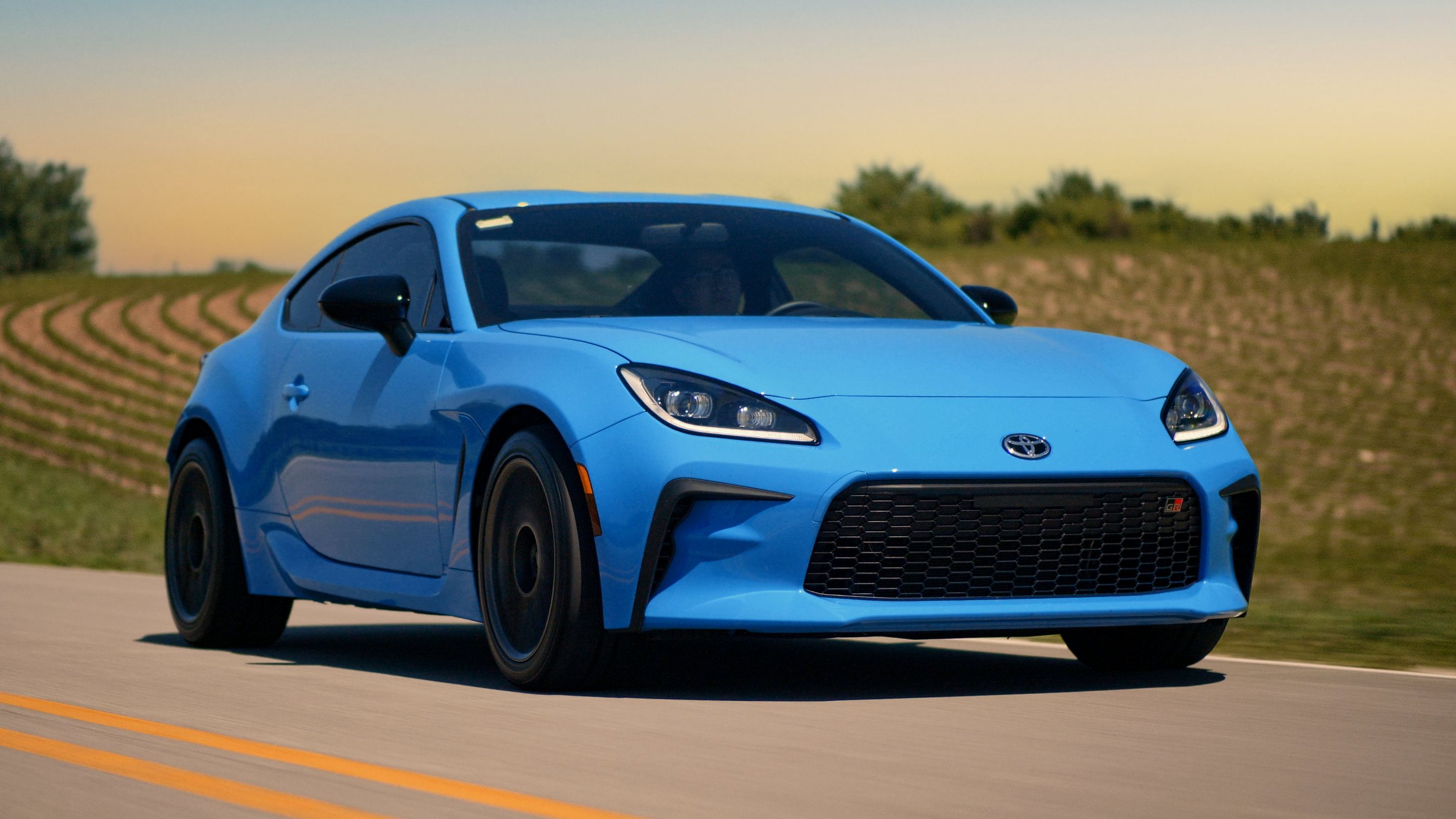 Blue Toyota GR86 with 17" ARC-8 Apex wheels in Anthracite