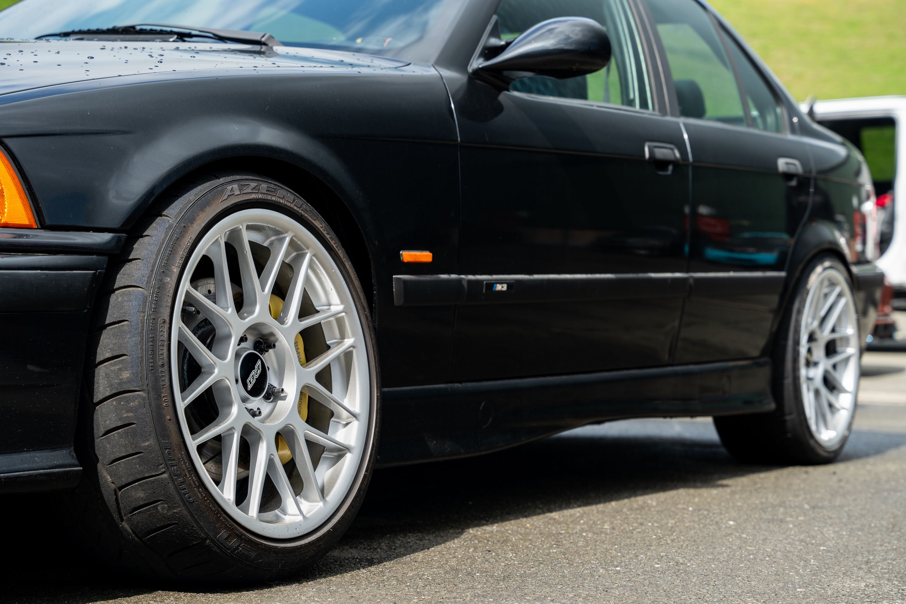 Black BMW E36 M3 with 18" ARC-8 Apex wheels in Race Silver