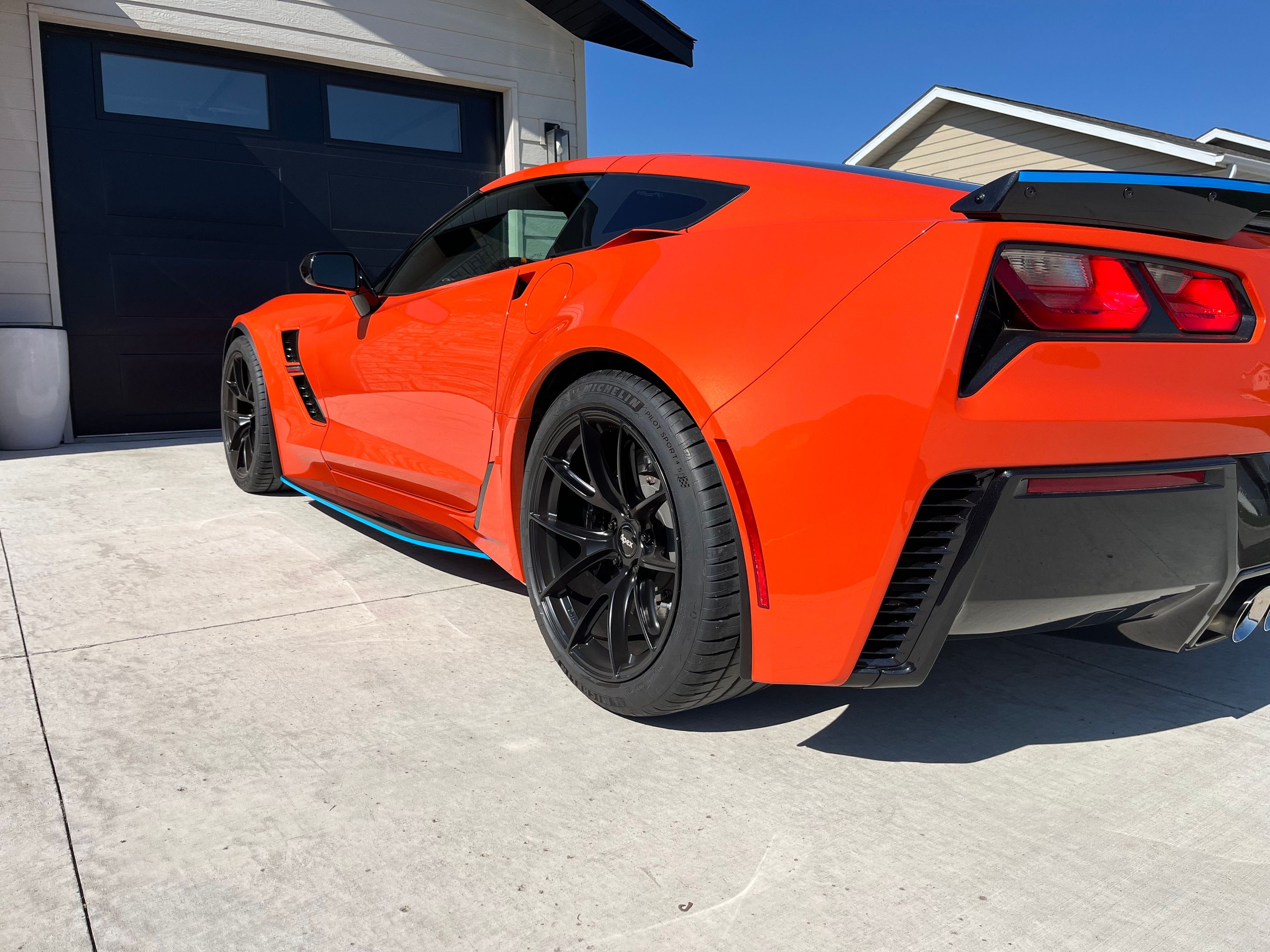 Orange Chevrolet C7 Corvette Grand Sport with 19" VS-5RS Apex wheels in Satin Black