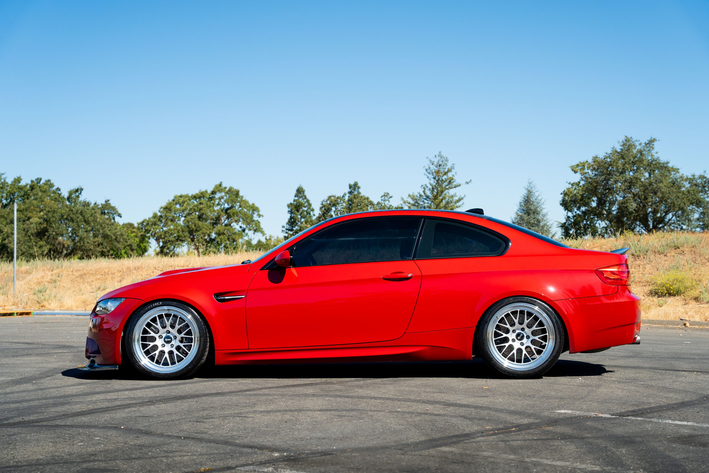 Red BMW E92 Coupe M3 with 19" ML-10RT Apex wheels in Machined Lip Race Silver