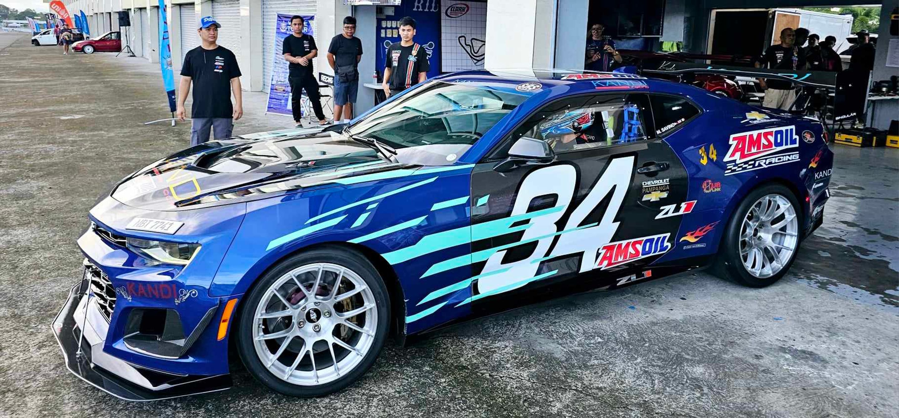 Blue Chevrolet 6th Gen Camaro ZL1 with 19" EC-7RS Apex wheels in Brushed Clear