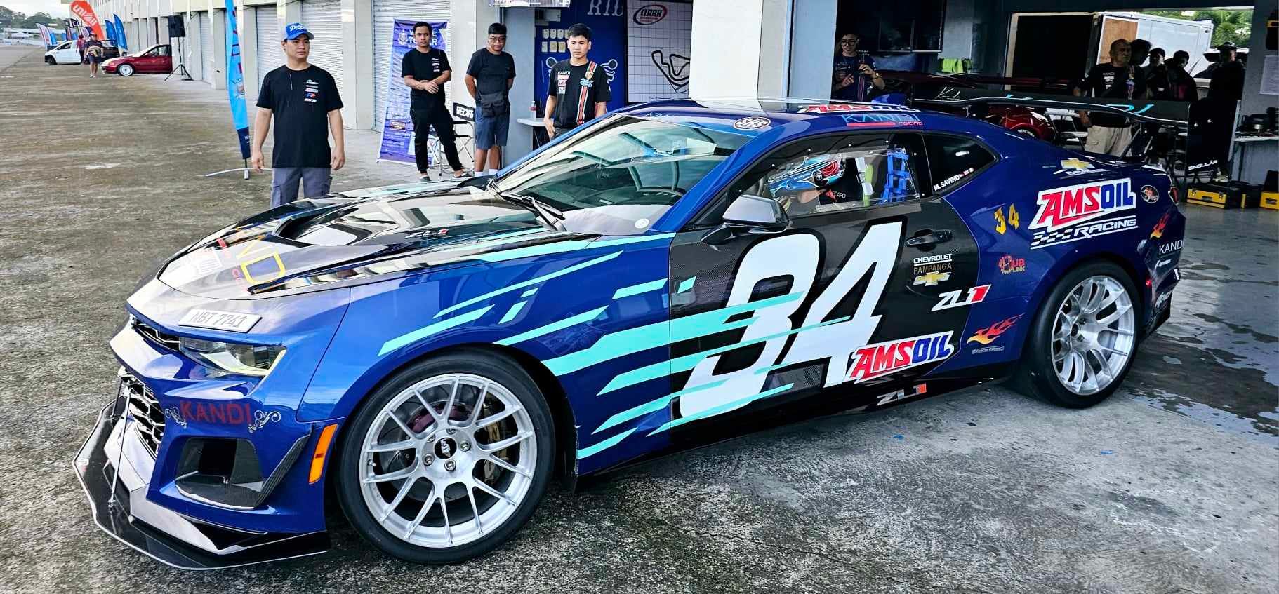 Blue Chevrolet 6th Gen Camaro ZL1 with 19" EC-7RS Apex wheels in Brushed Clear