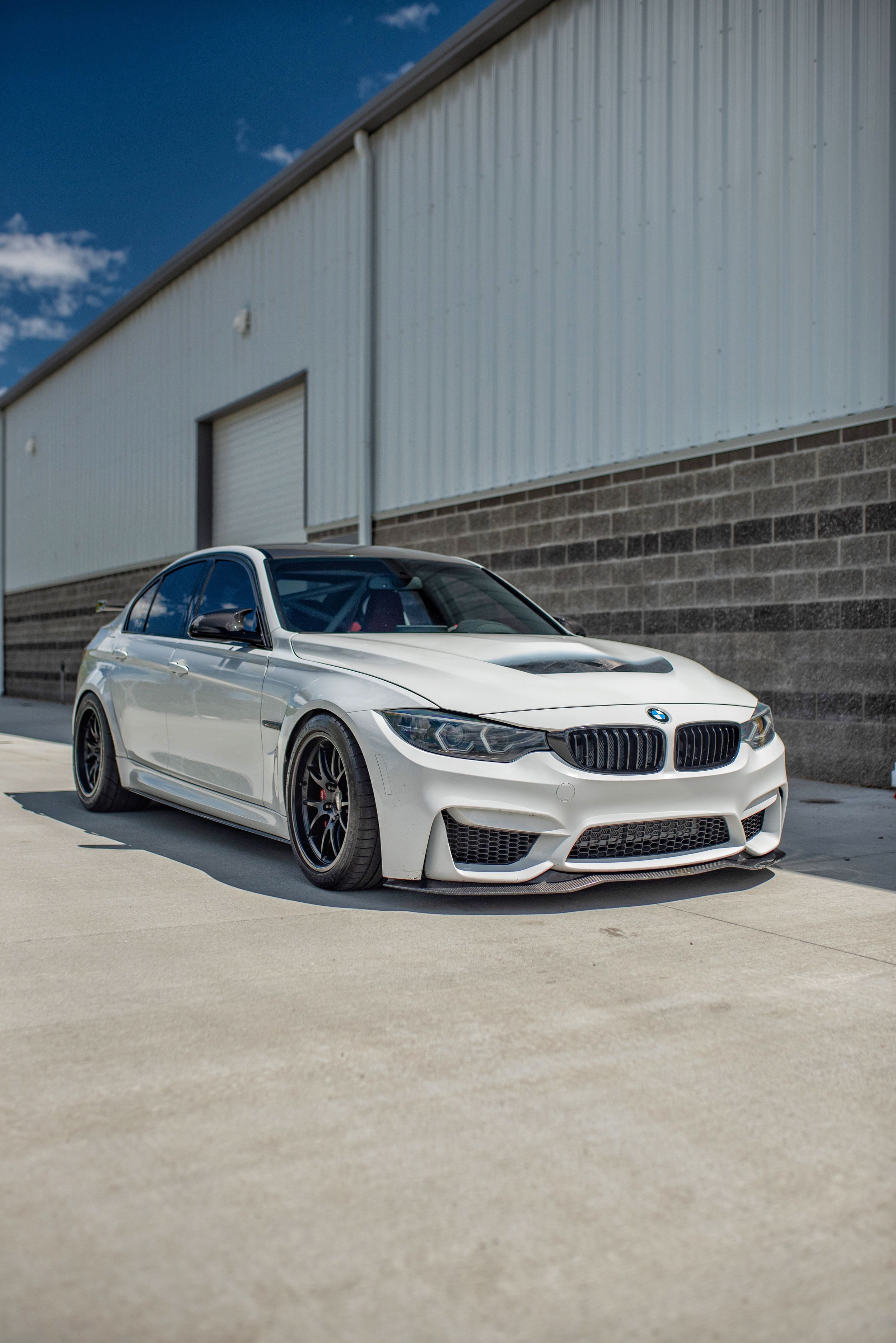 White BMW F80 M3 with 18" FL-5 Apex wheels in Satin Black