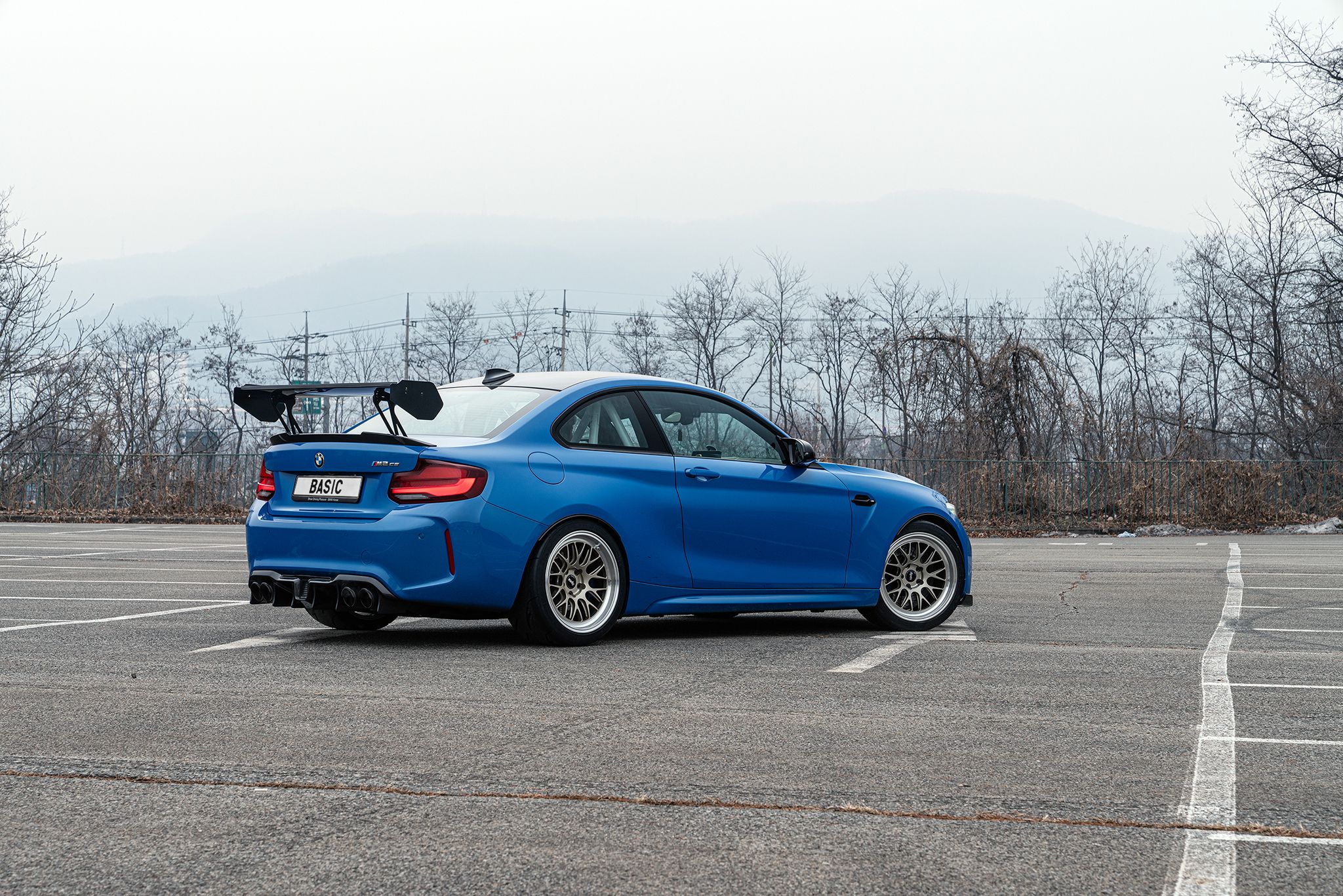 Blue BMW F87 M2 with 18" ML-10RT Apex wheels in Machined Lip Gloss Motorsport Gold