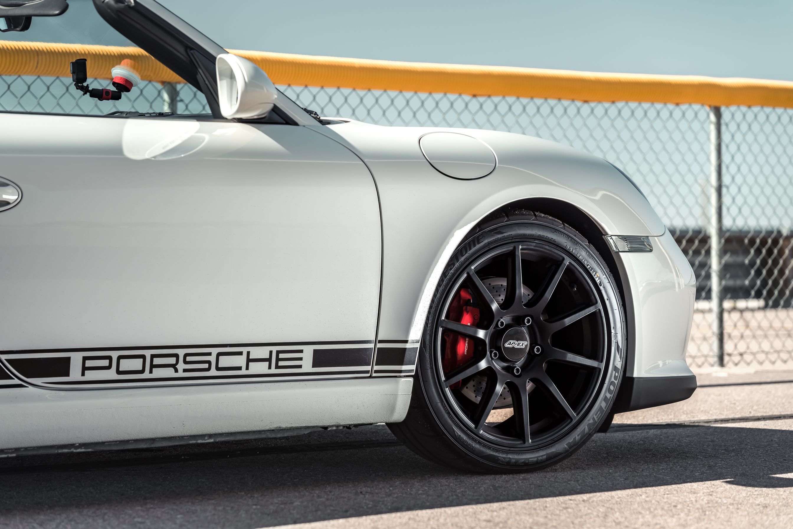 White Porsche 987 Boxster Spyder with 18" SM-10 Apex wheels in Satin Black