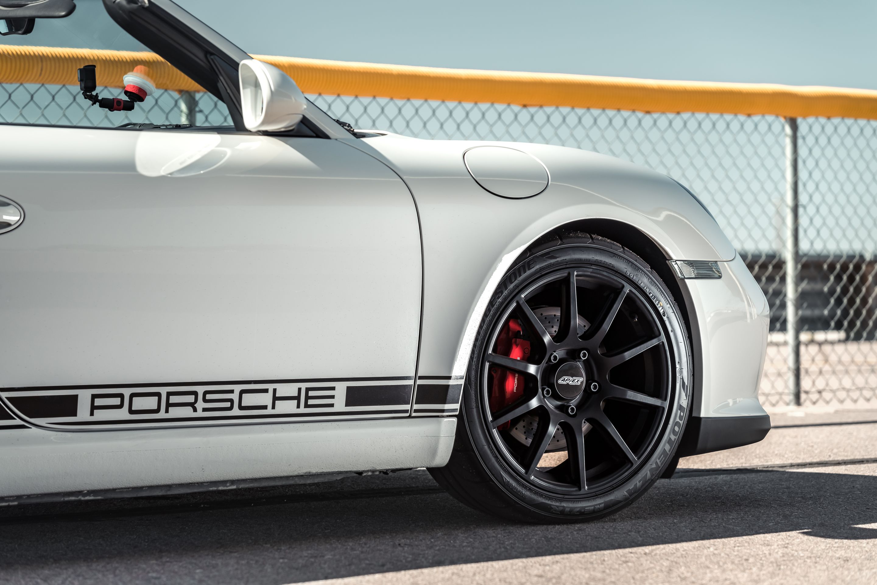 White Porsche 987 Boxster Spyder with 18" SM-10 Apex wheels in Satin Black