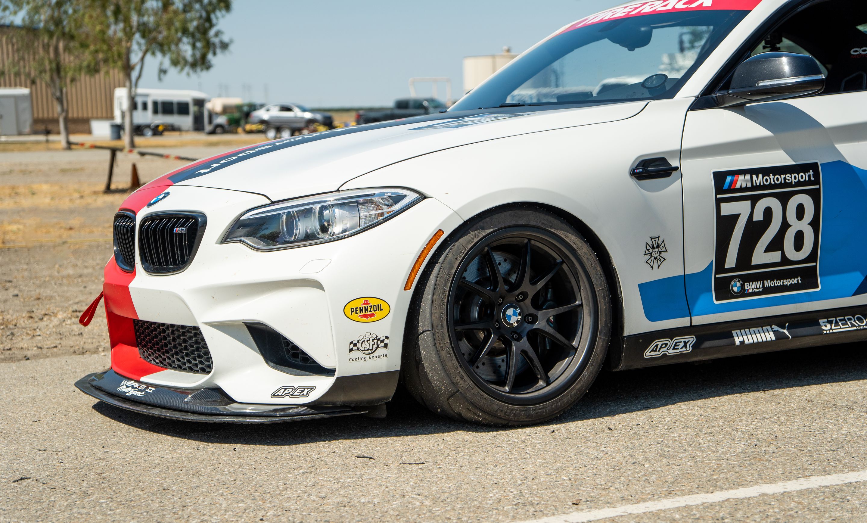 White BMW F87 M2 with 18" FL-5 Apex wheels in Satin Black