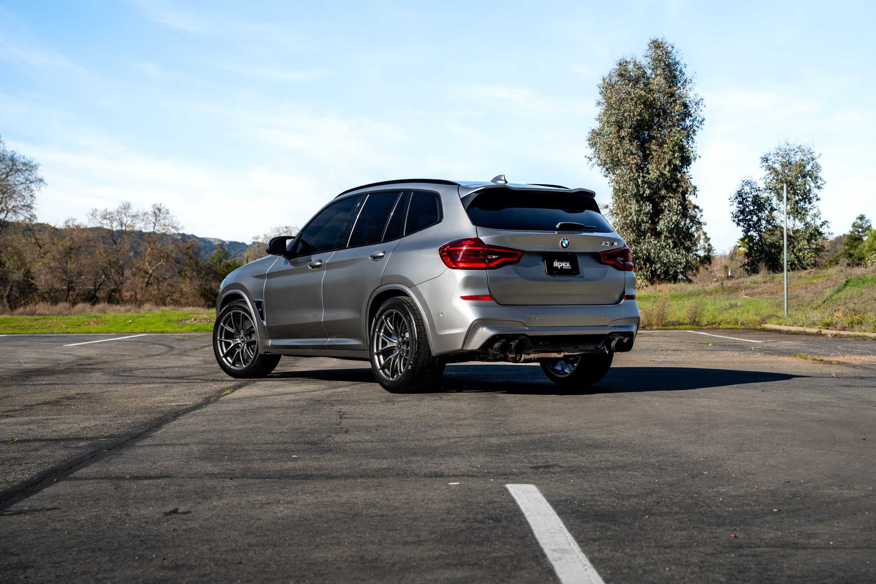 Silver BMW F97 X3M with 20" VS-5RX Apex wheels in Anthracite