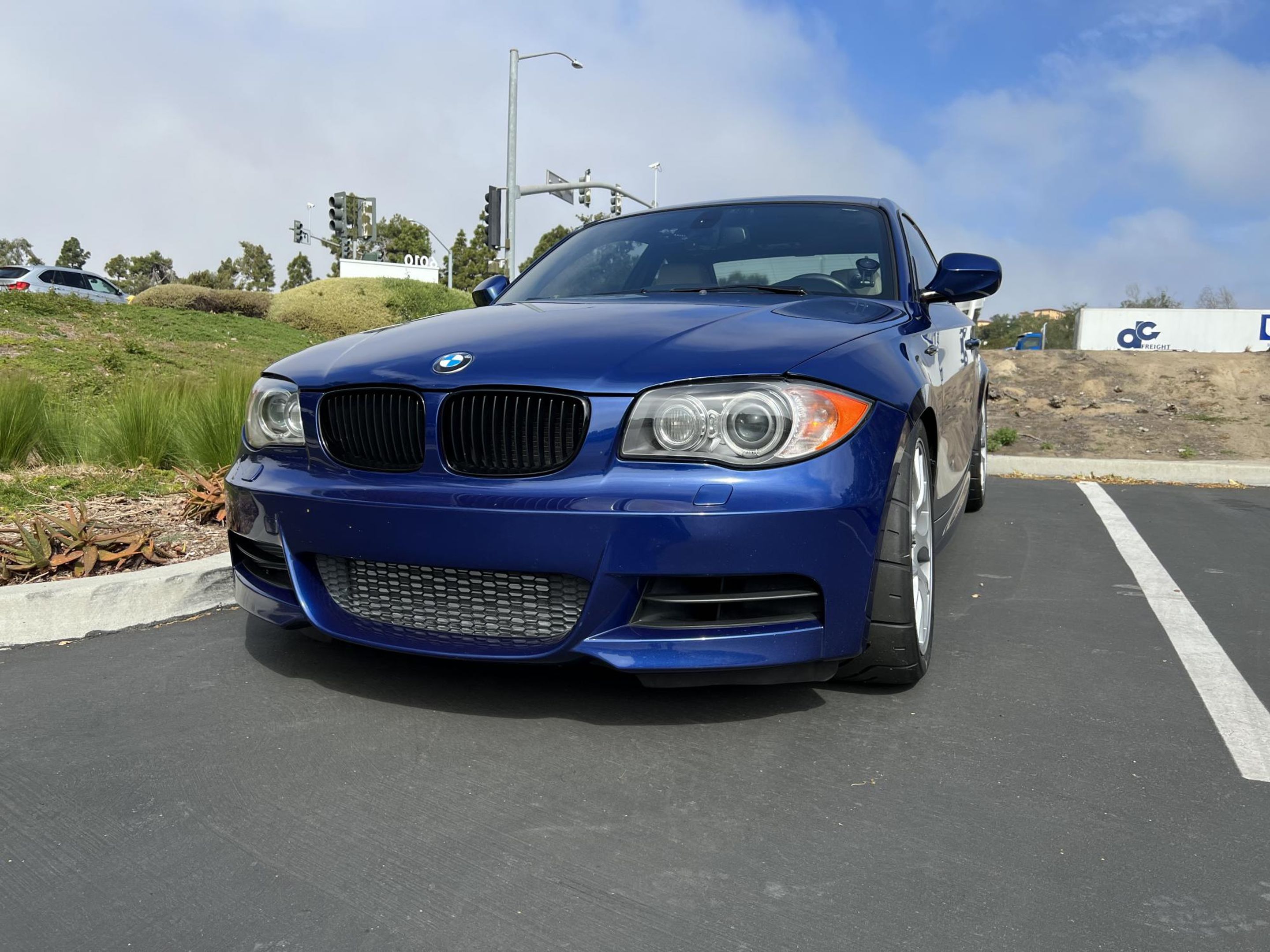Blue BMW E82 Coupe 1 Series with 18" EC-7 Apex wheels in Race Silver