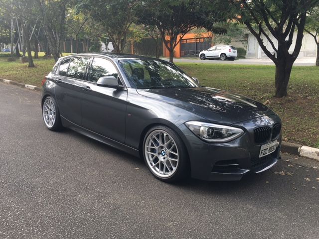 Grey BMW F20 Hatchback 1 Series with 18" ARC-8 Apex wheels in Hyper Silver