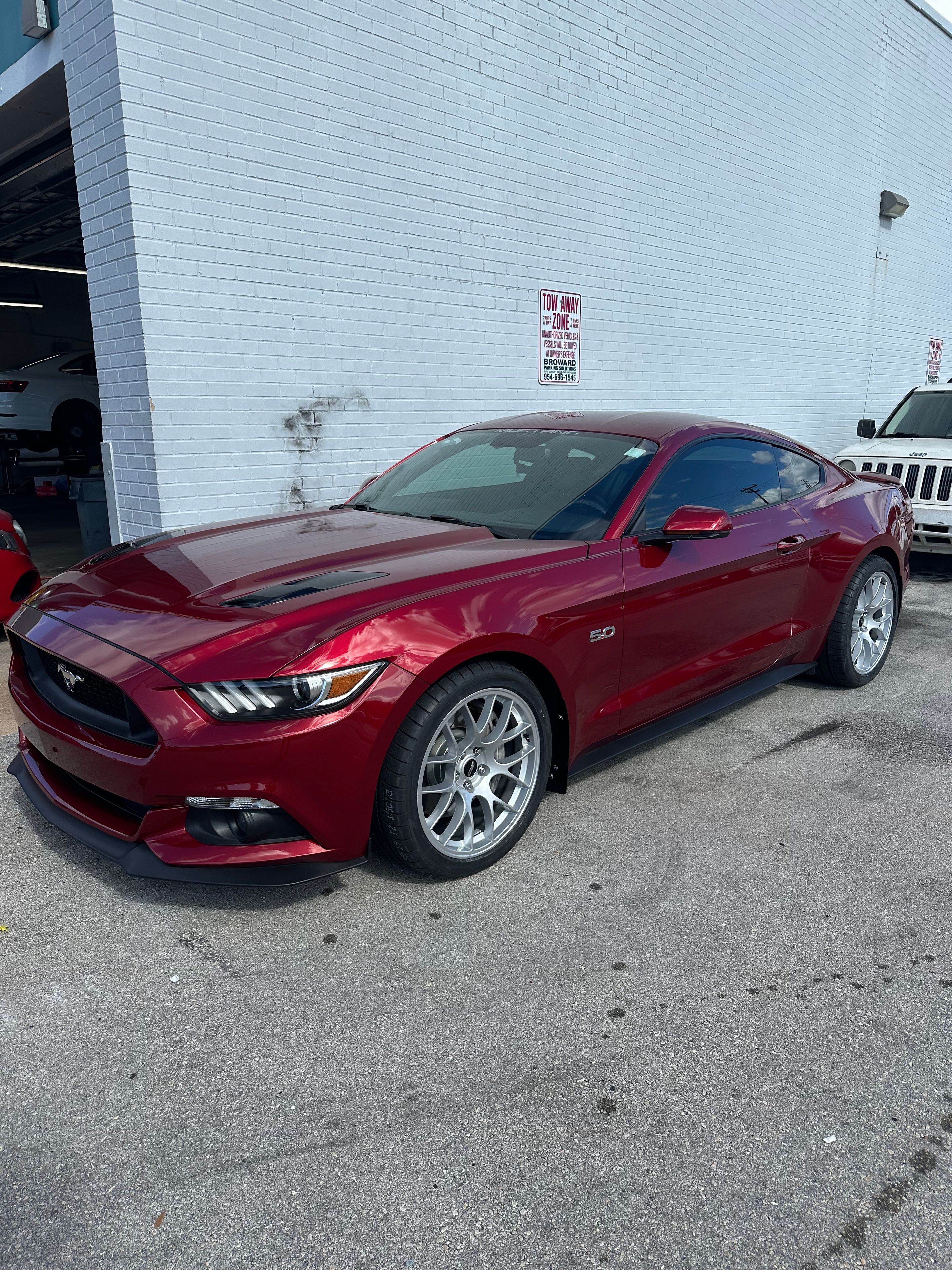 Red Ford S550 Mustang GT with 19" EC-7 Apex wheels in Race Silver
