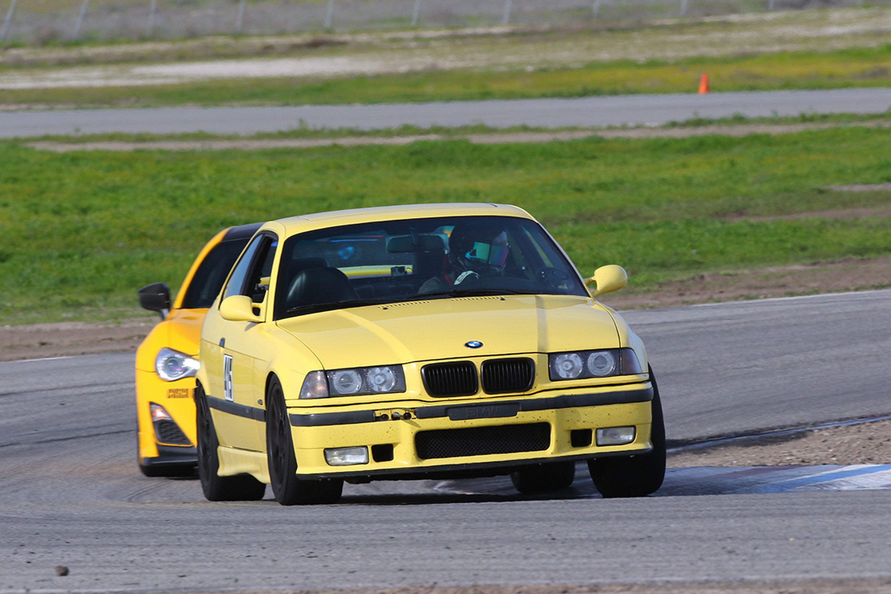 Yellow BMW E36 M3 with 17" ARC-8 Apex wheels in Satin Black