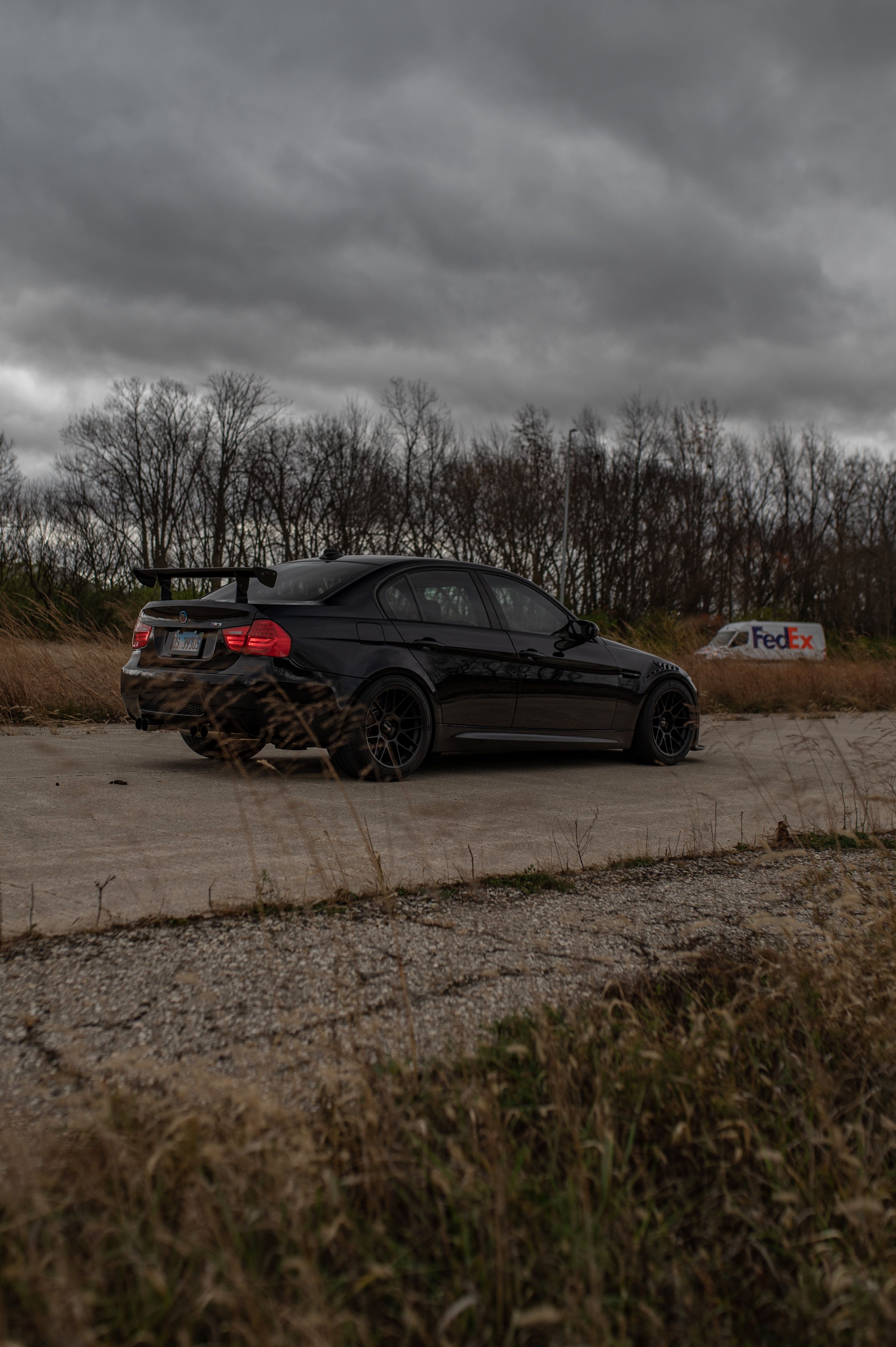 Black BMW E90 Sedan M3 with 18" ARC-8 Apex wheels in Satin Black