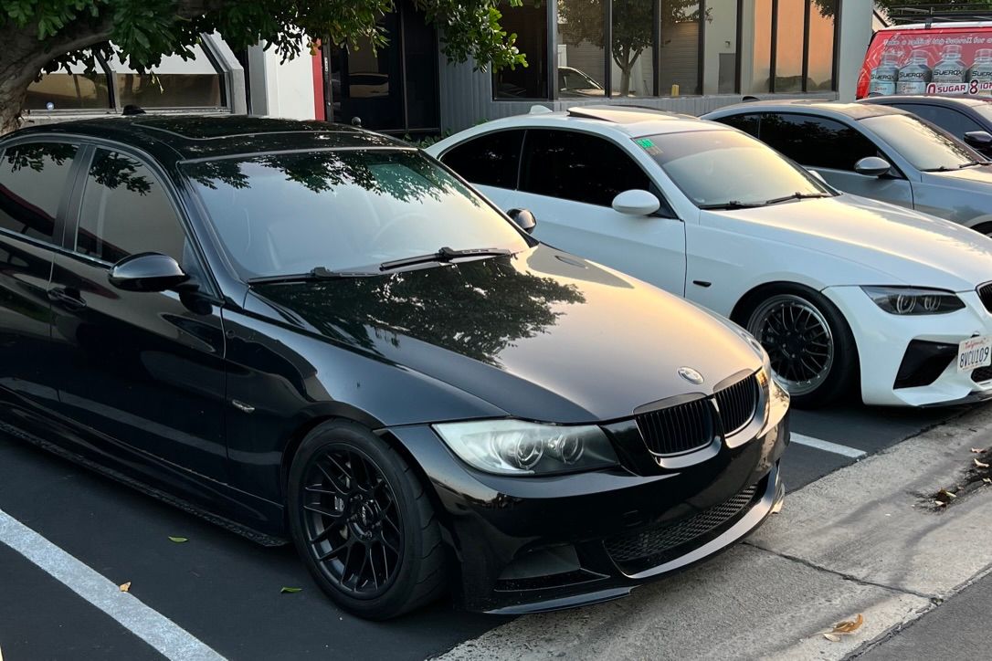Black BMW E90 Sedan 3 Series with 17" ARC-8 Apex wheels in Satin Black