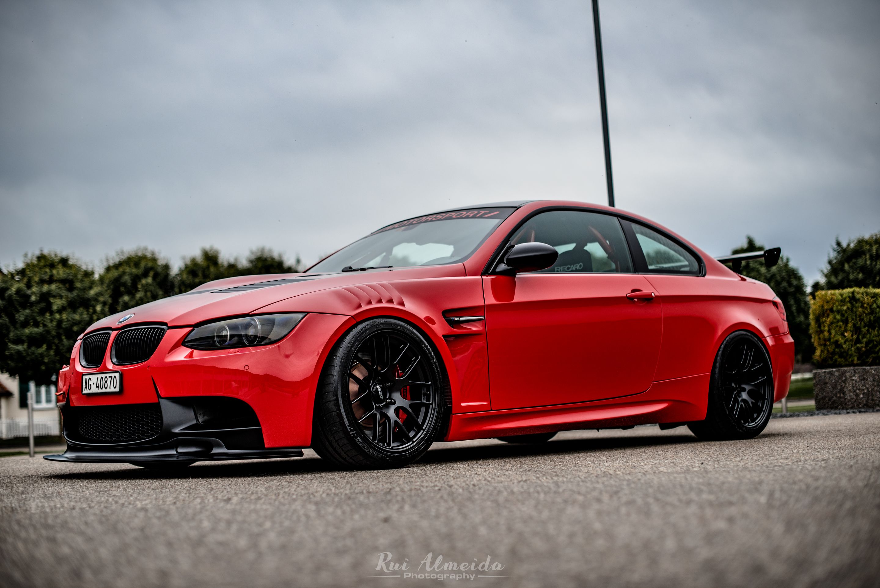 Red BMW E92 Coupe M3 with 18" EC-7R Apex wheels in Satin Black