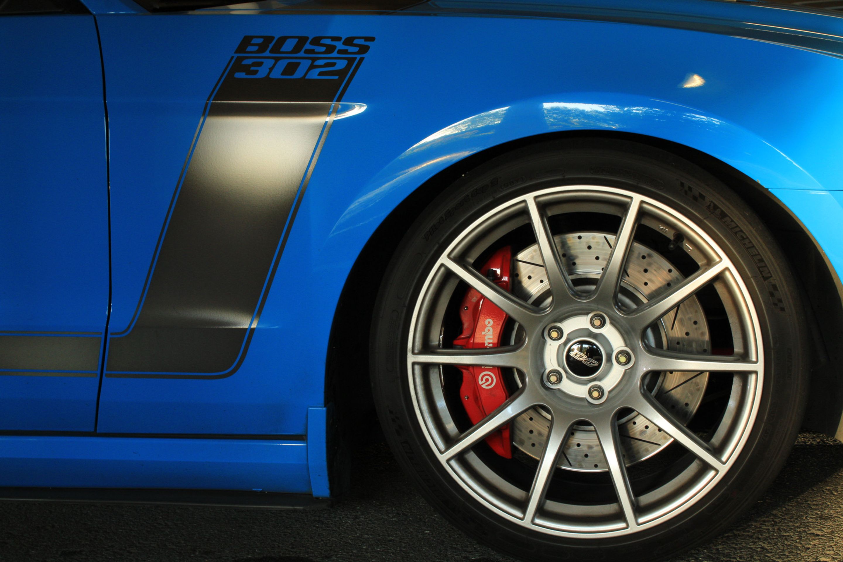 Blue Ford S197 Mustang Boss 302 with 19" SM-10 Apex wheels in Race Silver