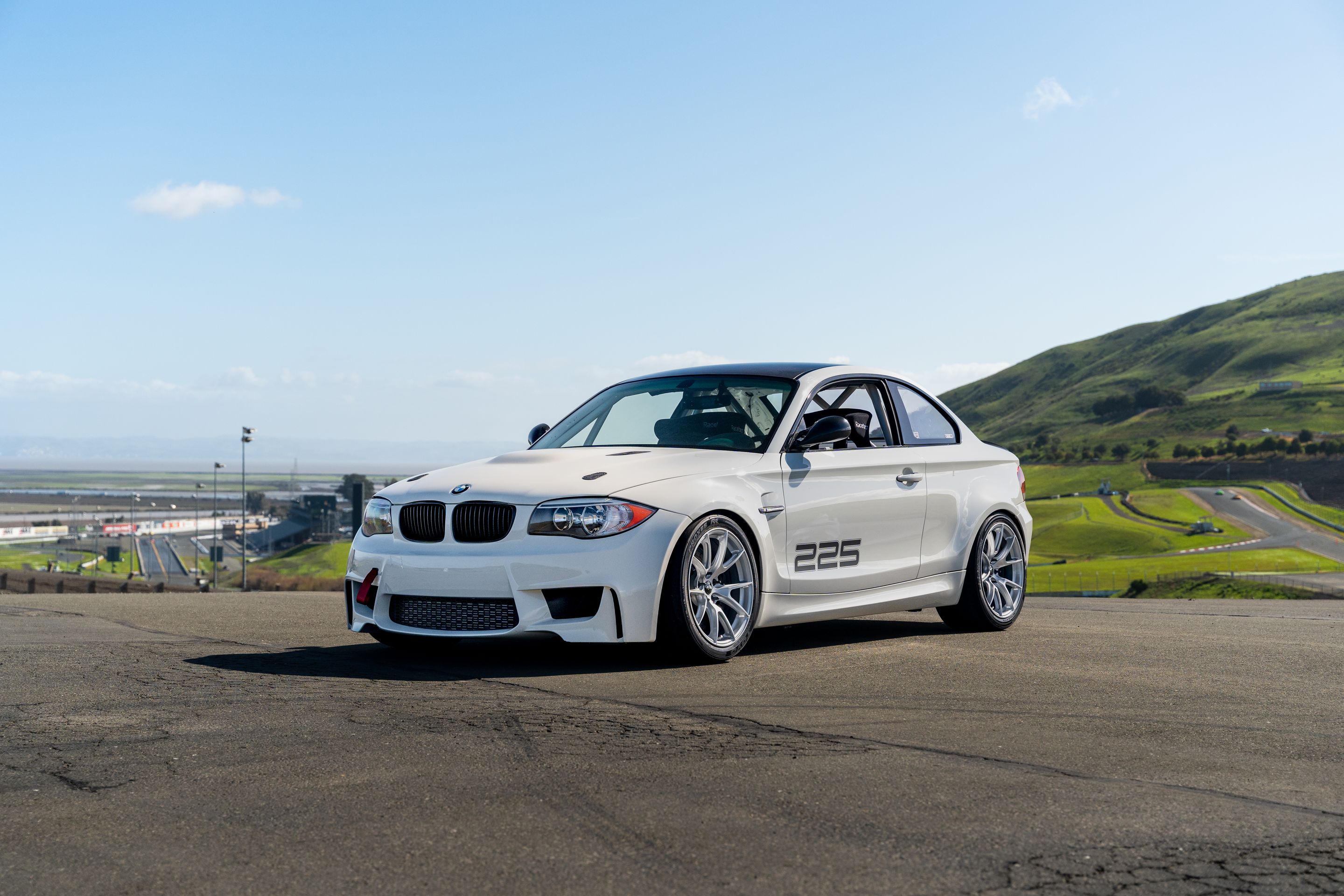White BMW E82 1M with 18" VS-5 Apex wheels in Race Silver