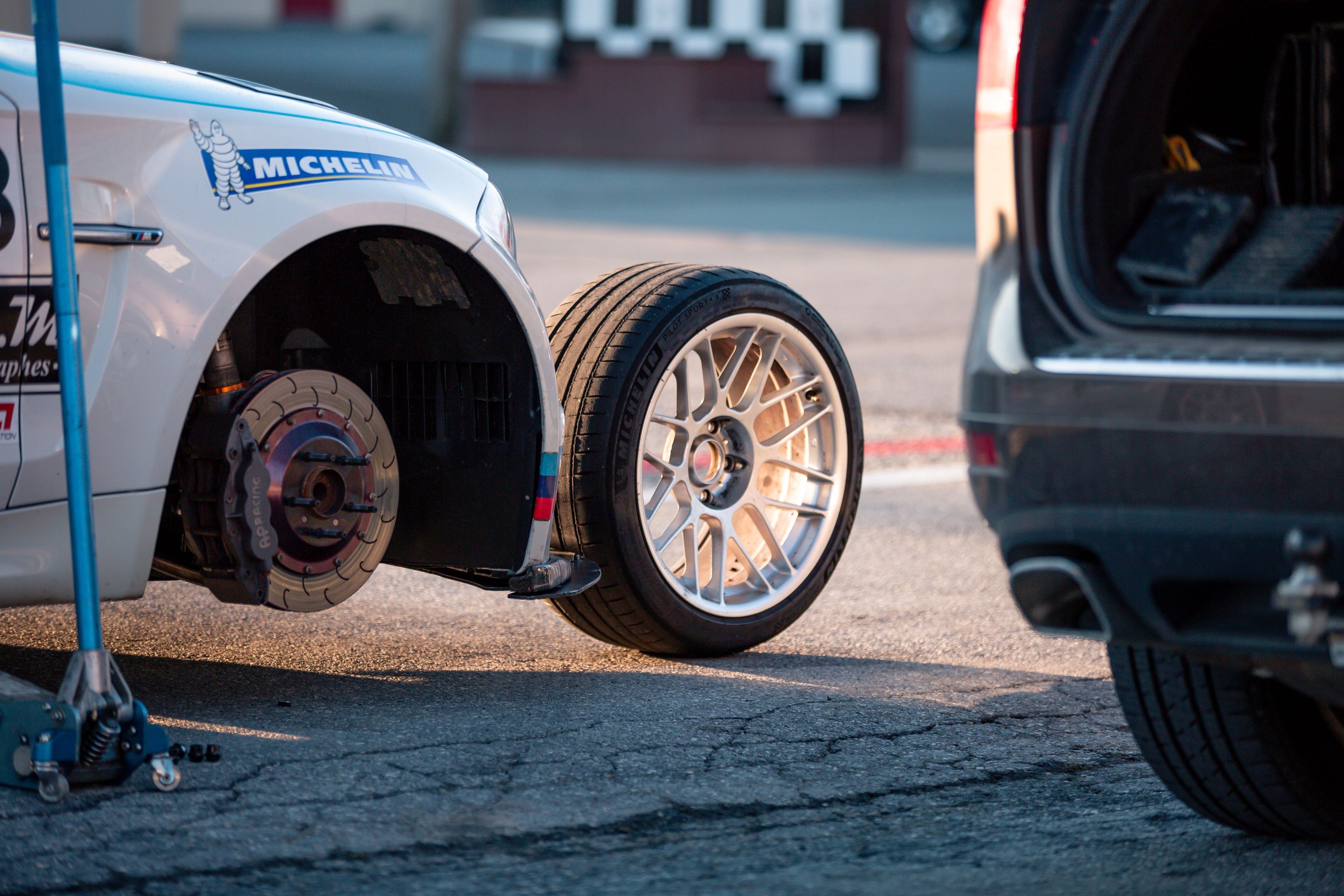White BMW E82 1M with 18" ARC-8 Apex wheels in Hyper Silver