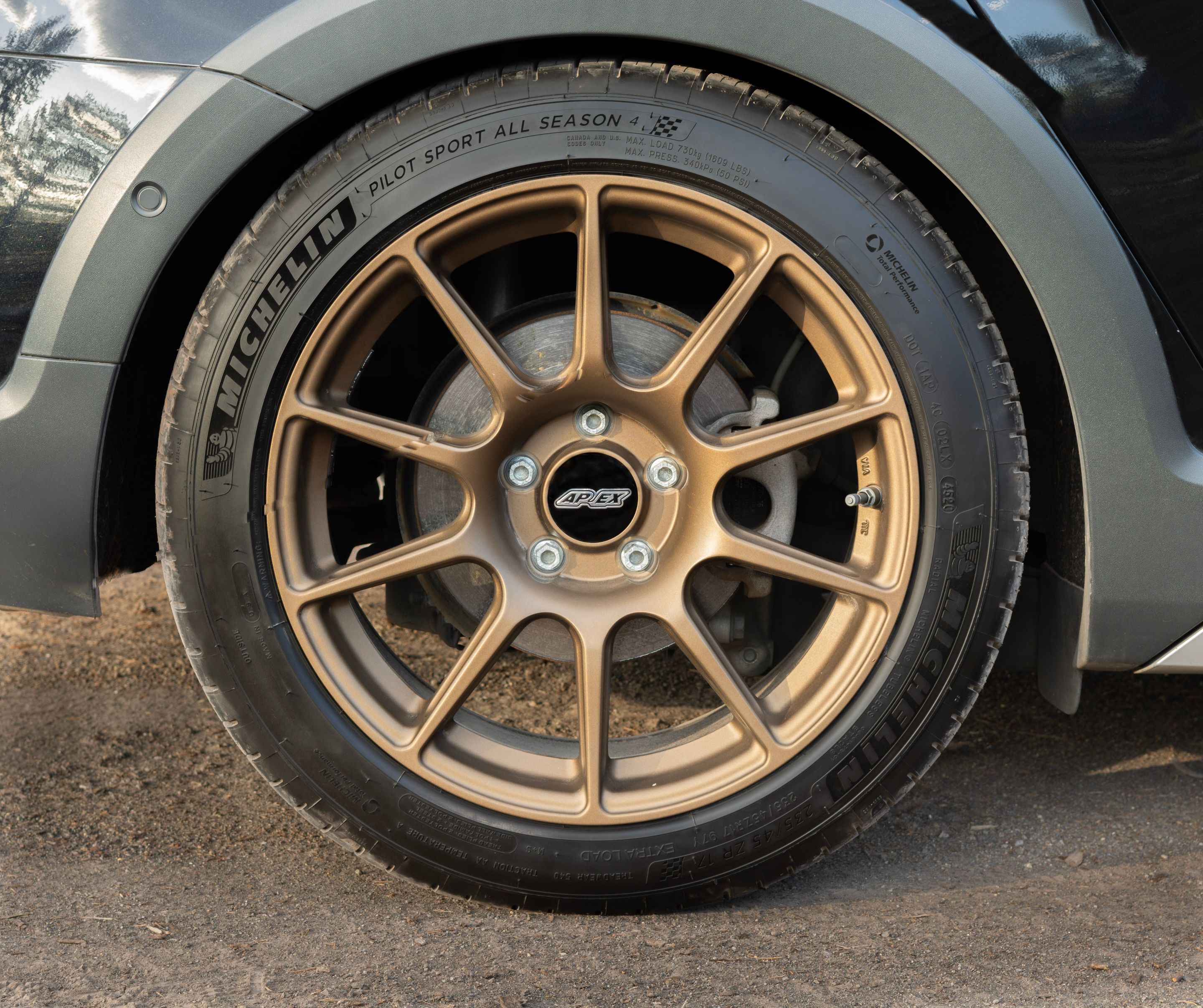 Black VW MK7 Alltrack/SportWagen Golf SportWagen with 17" SM-10 Apex wheels in Satin Bronze