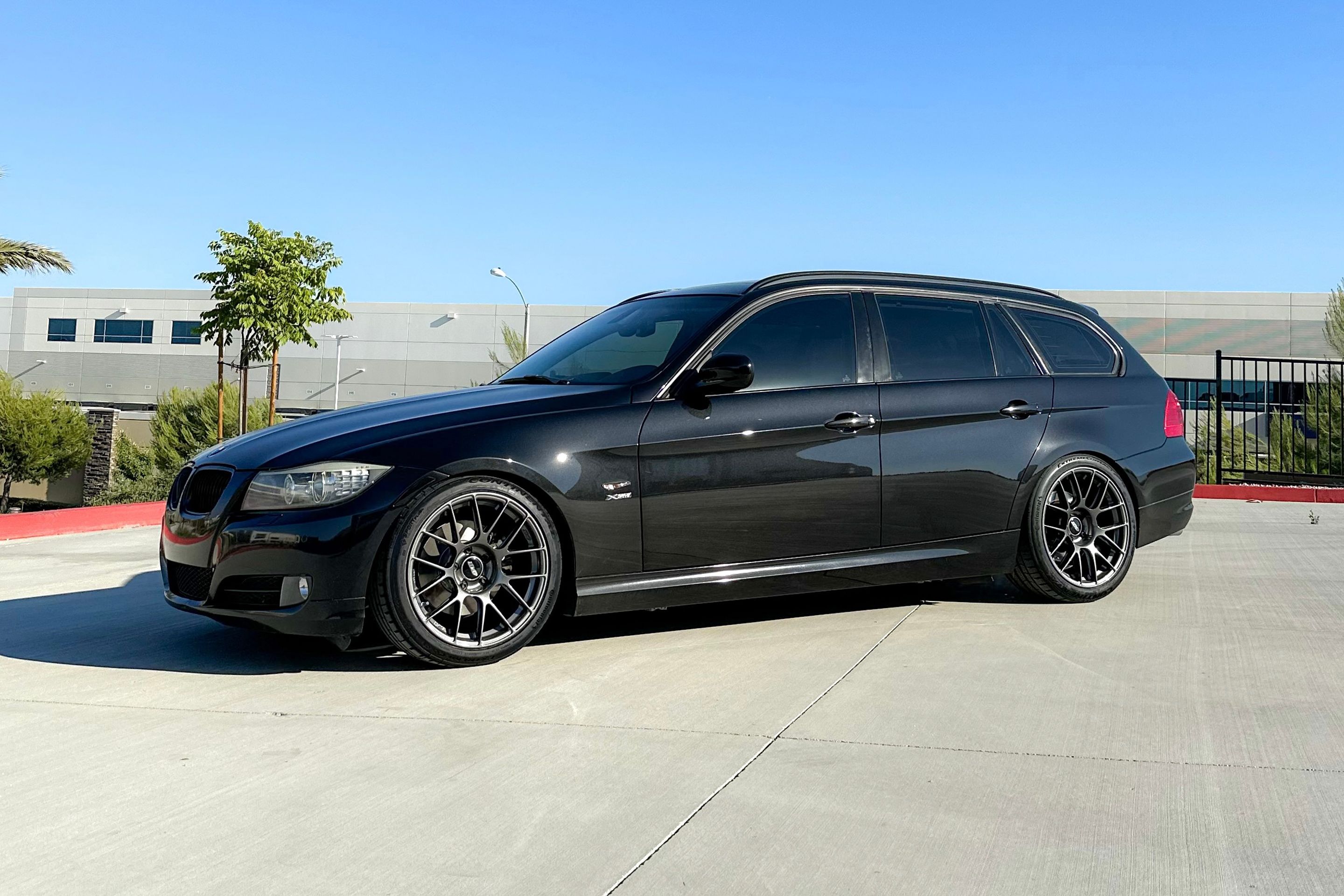 Grey BMW E91 Wagon 3 Series with 18" EC-7RS Apex wheels in Anthracite