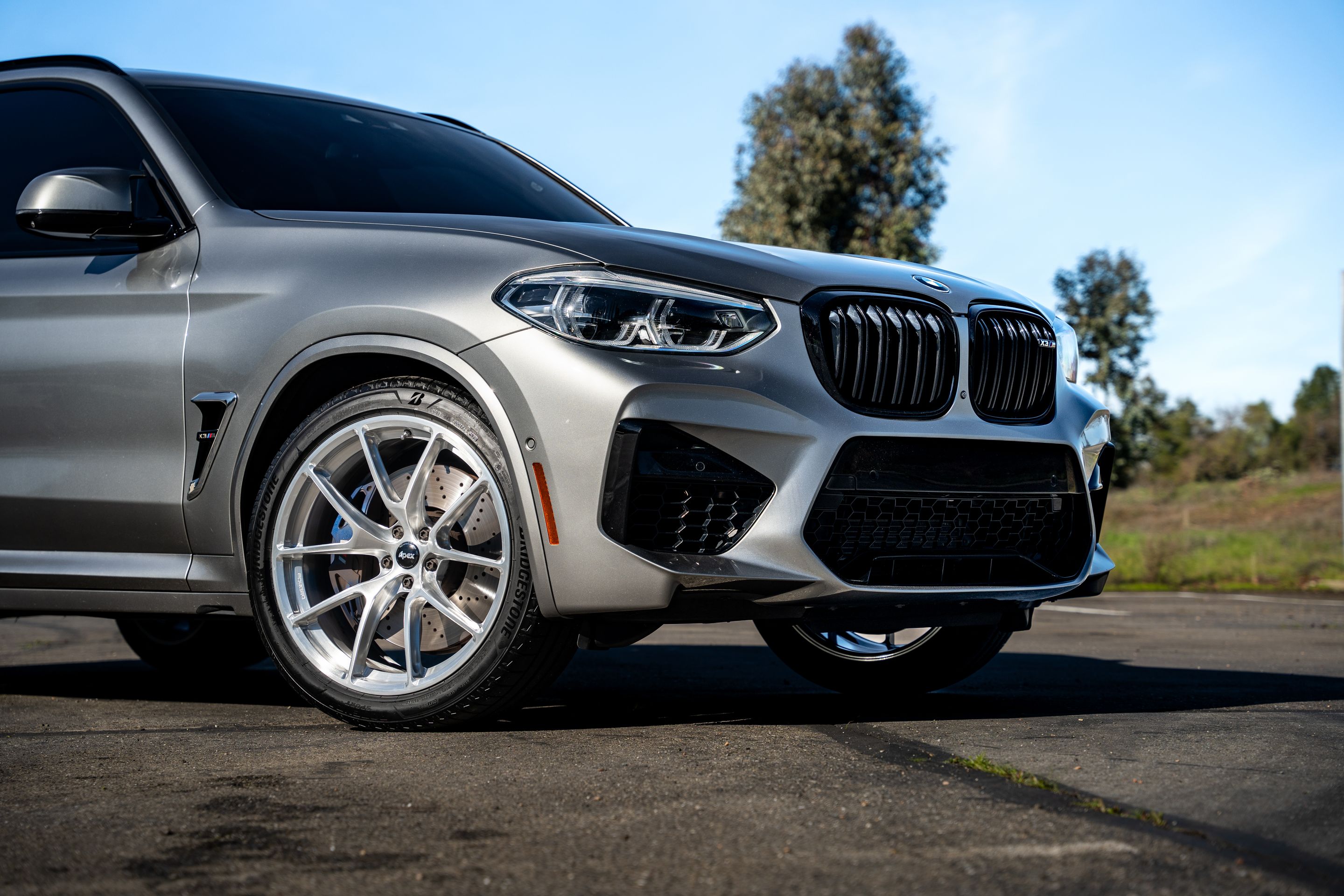 Silver BMW F97 X3M with 21" VS-5RX Apex wheels in Brushed Clear