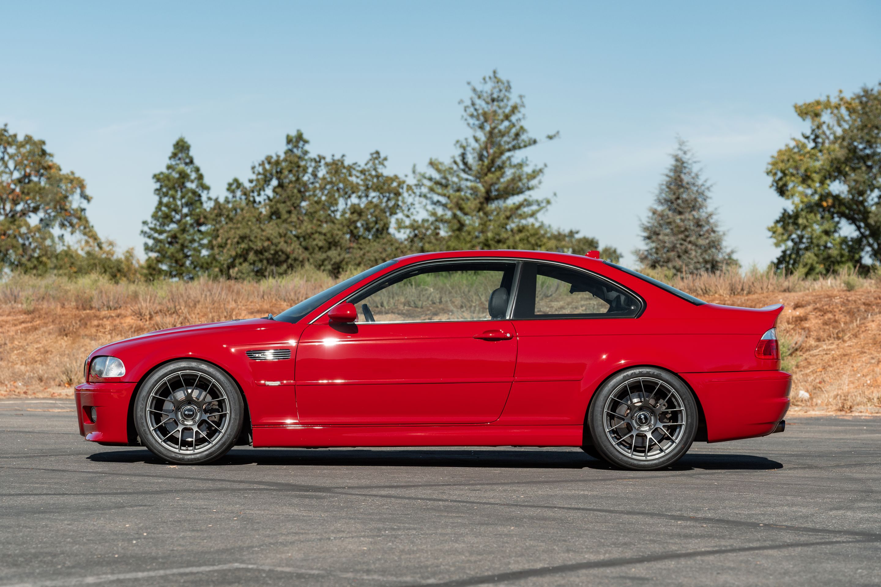 Red BMW E46 M3 with 18" EC-7RS Apex wheels in Anthracite