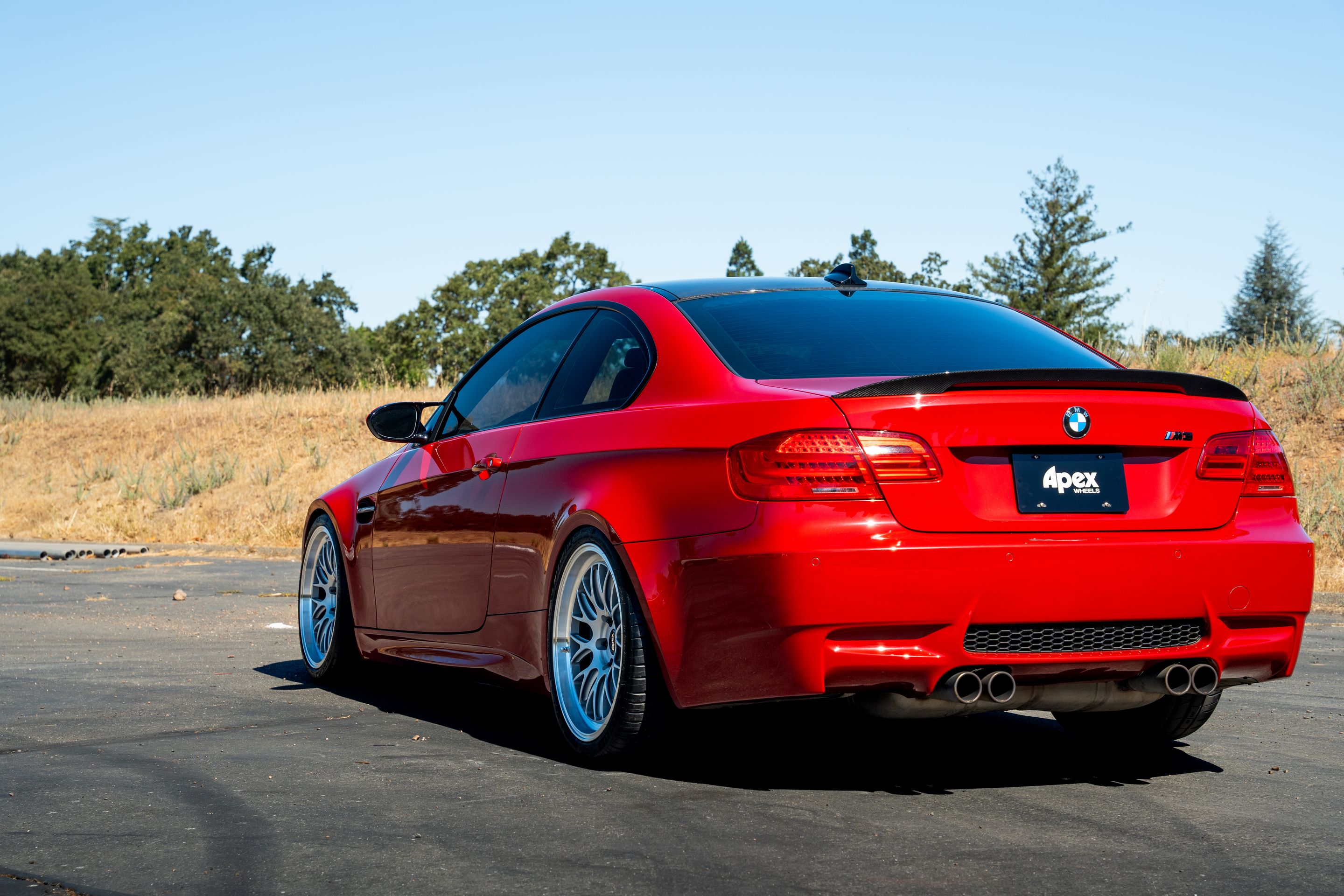 Red BMW E92 Coupe M3 with 19" ML-10RT Apex wheels in Machined Lip Race Silver