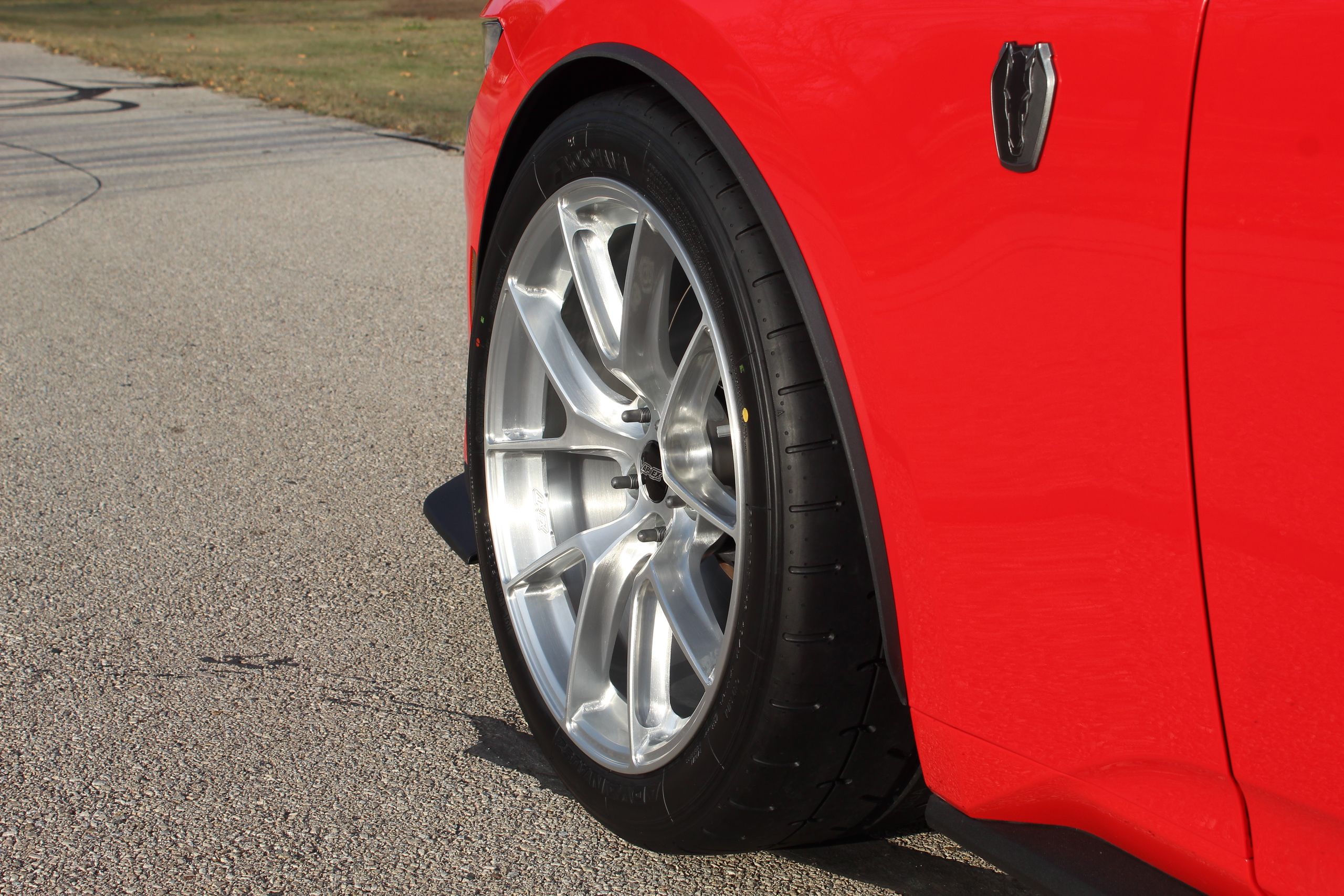 Red Ford S650 Mustang Dark Horse with 19" VS-5RS Apex wheels in Brushed Clear
