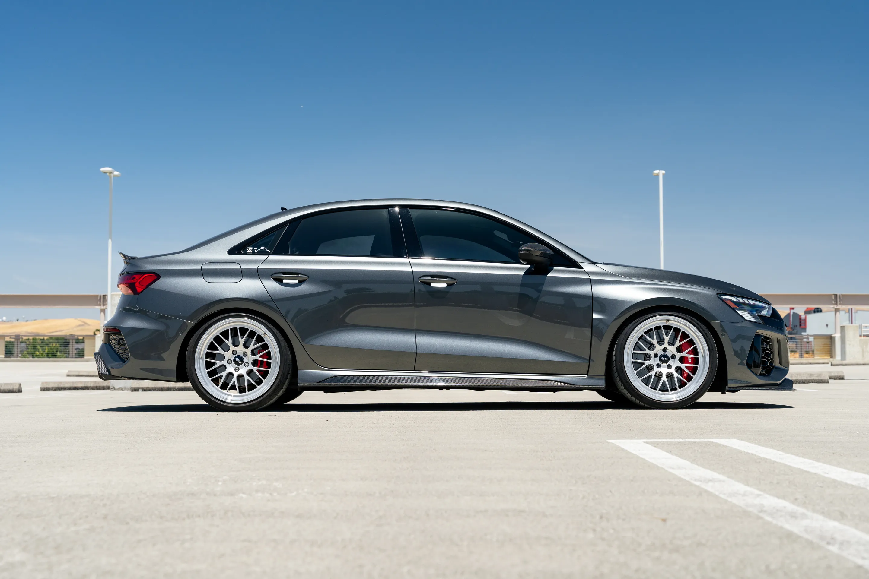 Grey Audi 8Y RS 3 with 19" ML-10RT Apex wheels in Machined Lip Race Silver