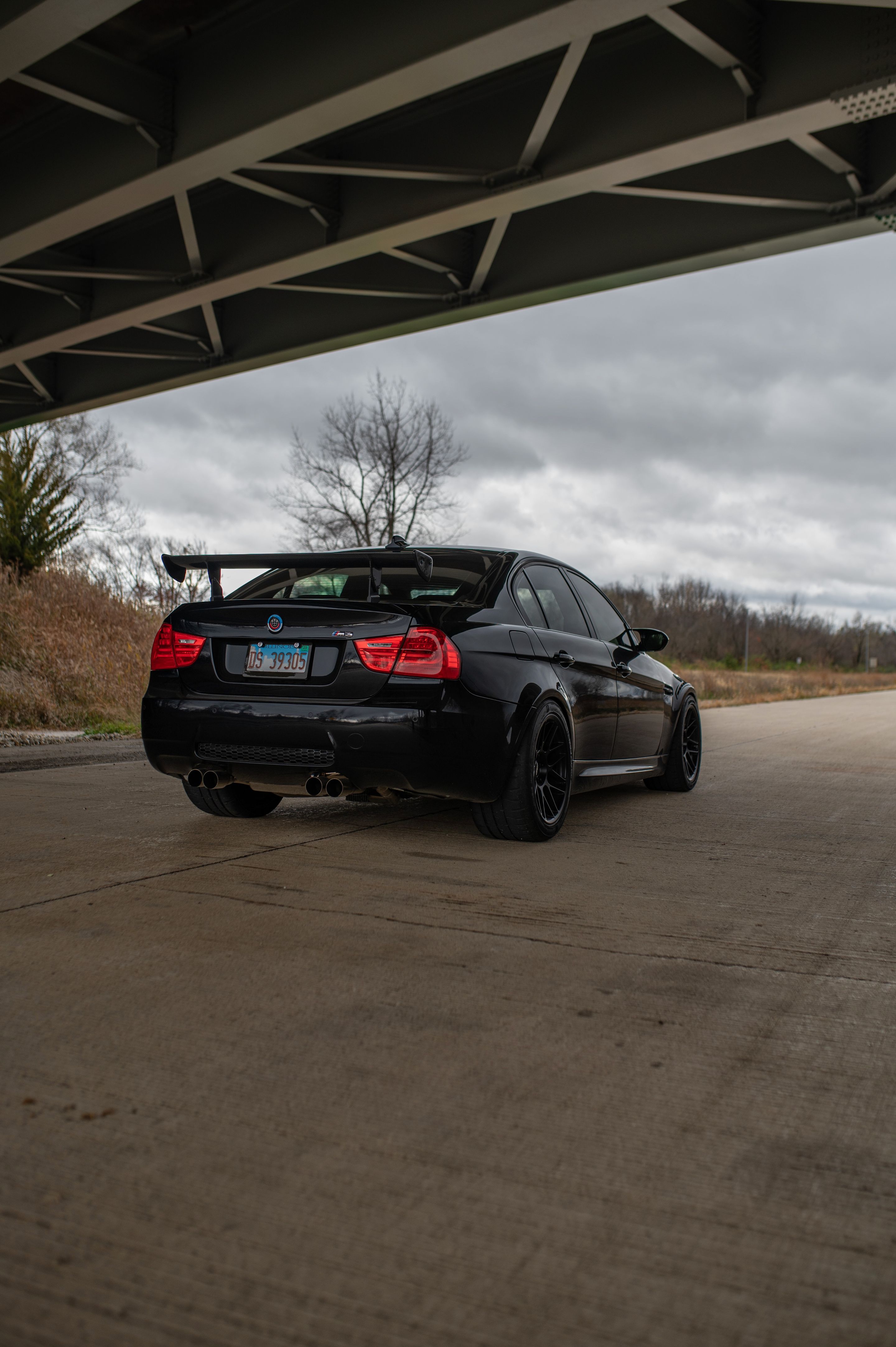 Black BMW E90 Sedan M3 with 18" ARC-8 Apex wheels in Satin Black