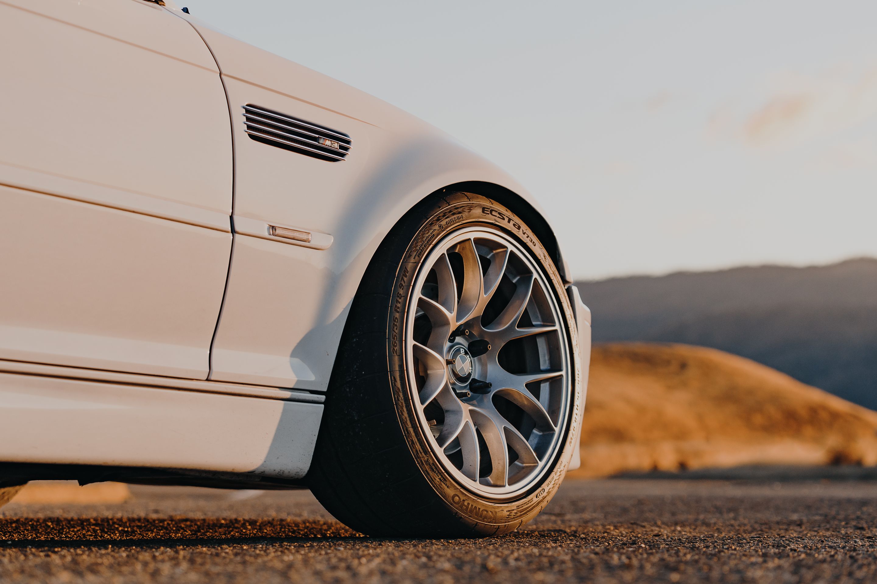 White BMW E46 M3 with 18" EC-7 Apex wheels in Race Silver