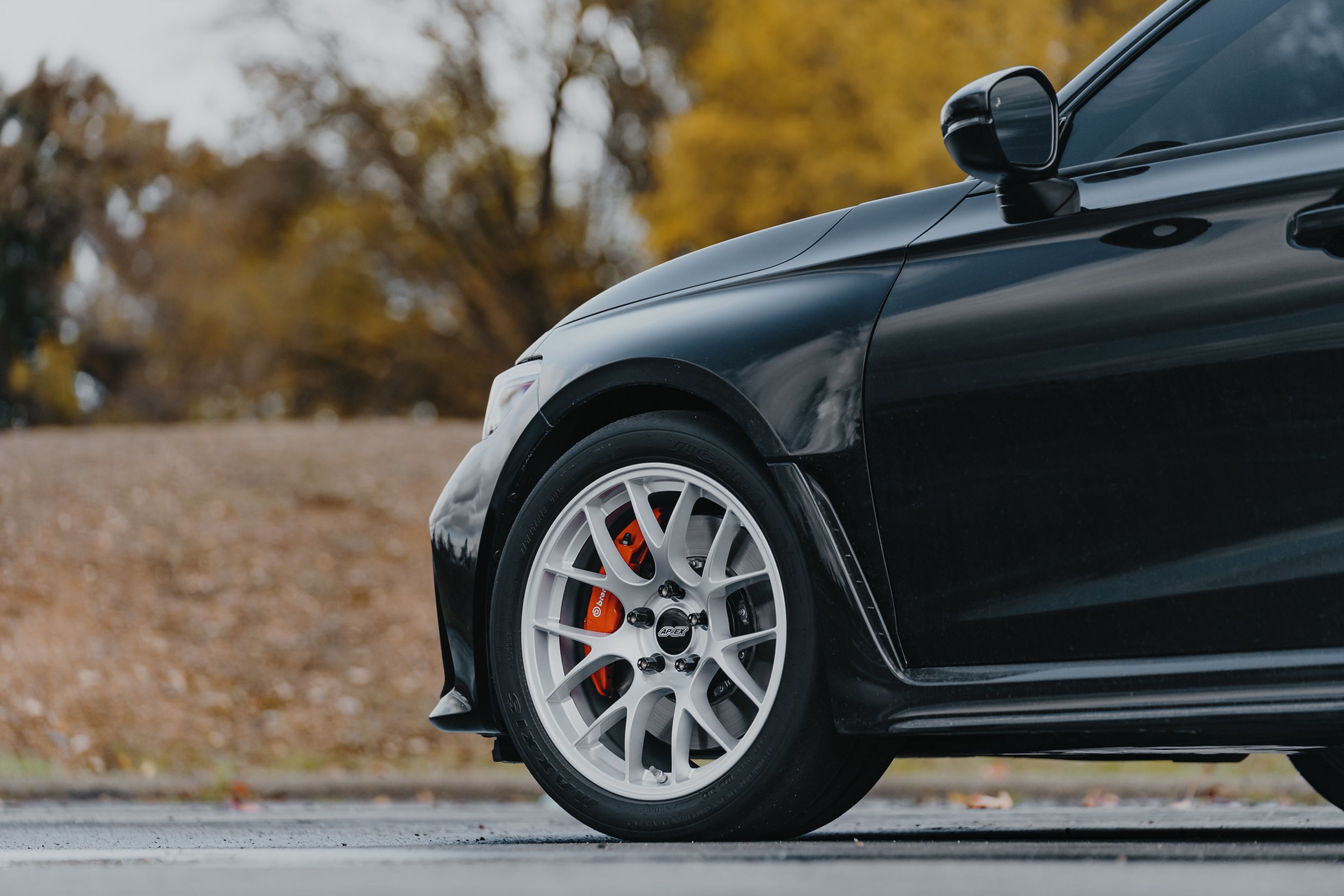 Black Honda FL5 Civic Type-R with 18" EC-7 Apex wheels in Race Silver