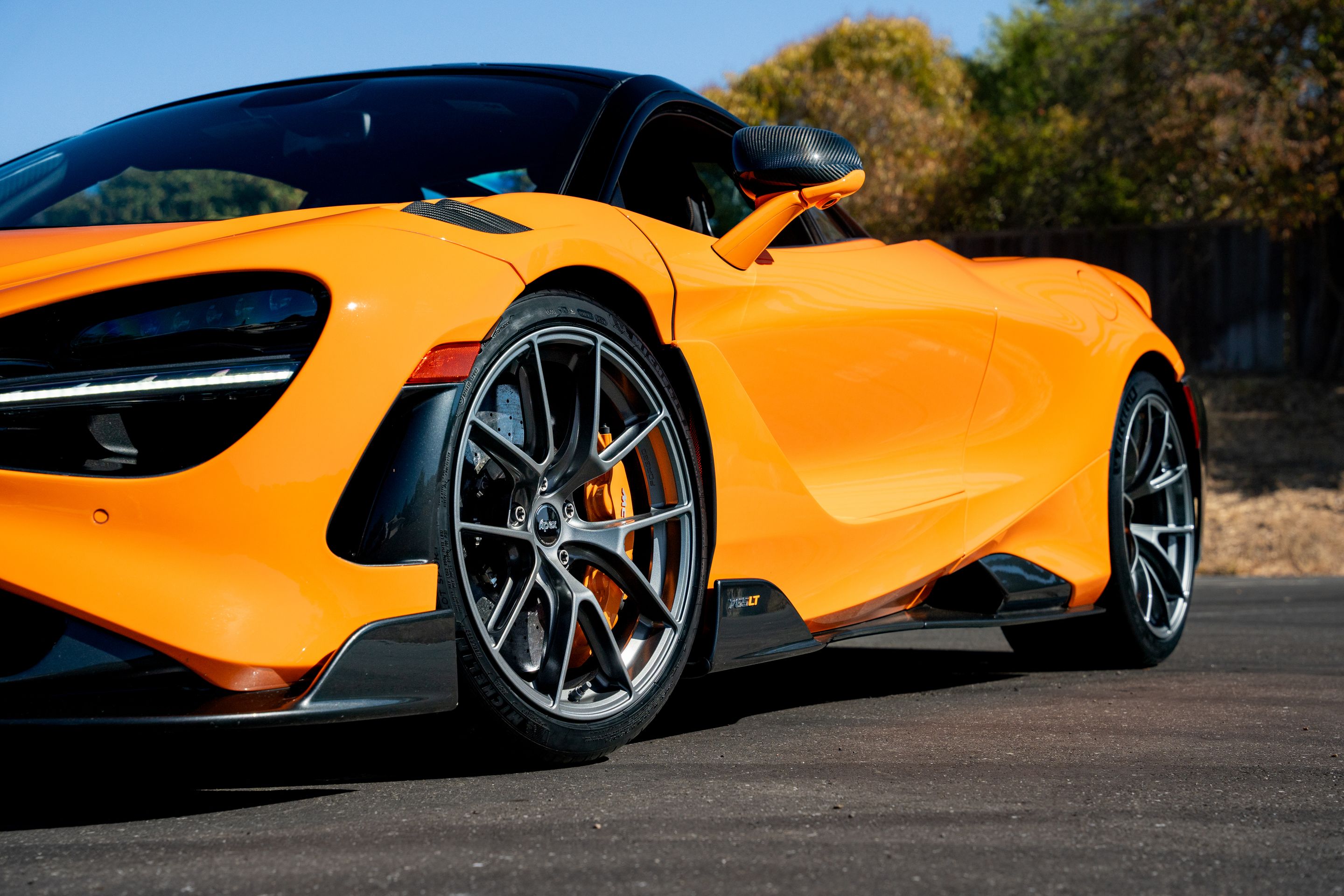 Orange McLaren 765LT with 19"/20" VS-5RS Apex wheels in Anthracite