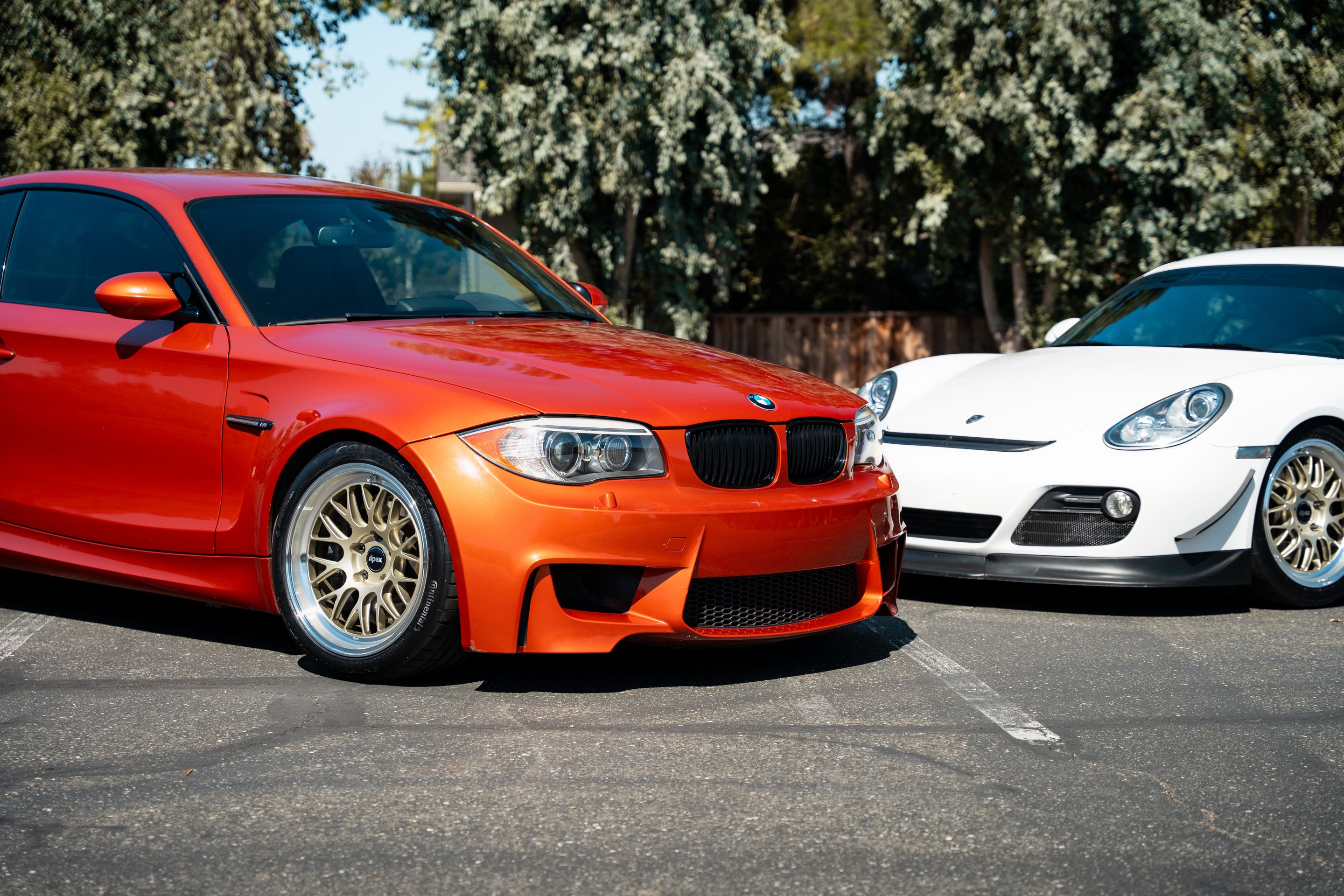 Orange BMW E82 1M with 18" ML-10RT Apex wheels in Machined Lip Gloss Motorsport Gold
